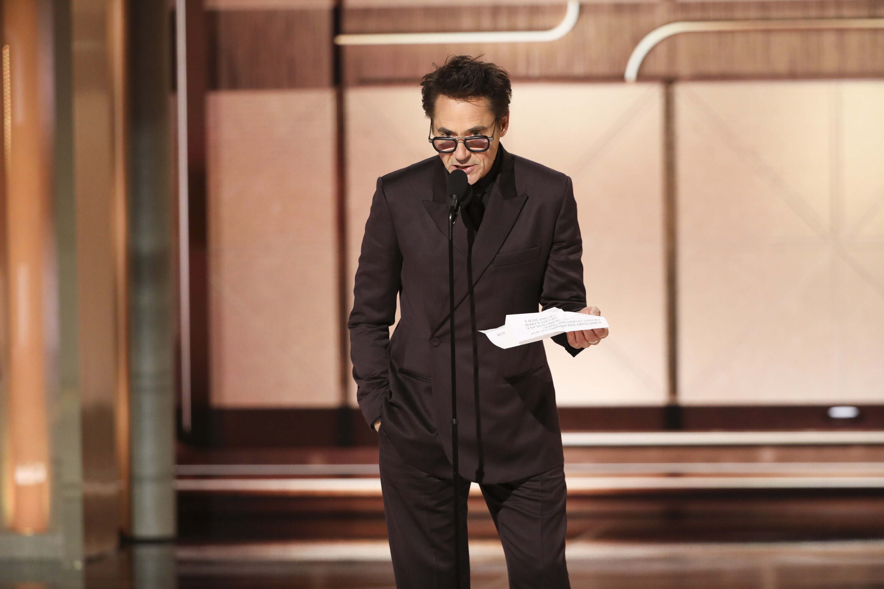 This image released by CBS shows Robert Downey Jr. accepting the award for best supporting actor in a motion picture for his role in "Oppenheimer" during the 81st Annual Golden Globe Awards in Beverly Hills, Calif., on Sunday.