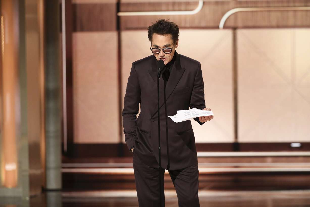 This image released by CBS shows Robert Downey Jr. accepting the award for best supporting actor in a motion picture for his role in "Oppenheimer" during the 81st Annual Golden Globe Awards in Beverly Hills, Calif., on Sunday.