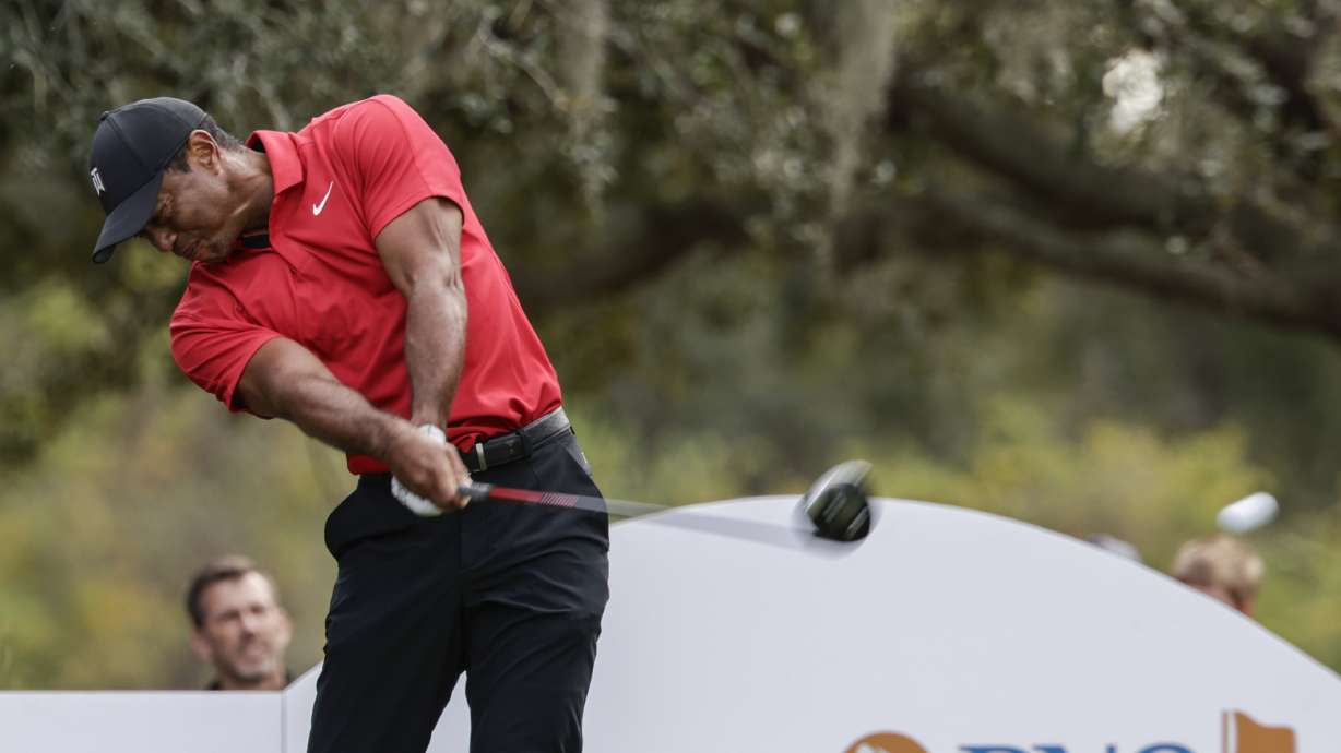 Tiger Woods tees off on the 13th hole during the final round of the PNC Championship golf tournament, Sunday, Dec. 17, 2023, in Orlando, Fla.