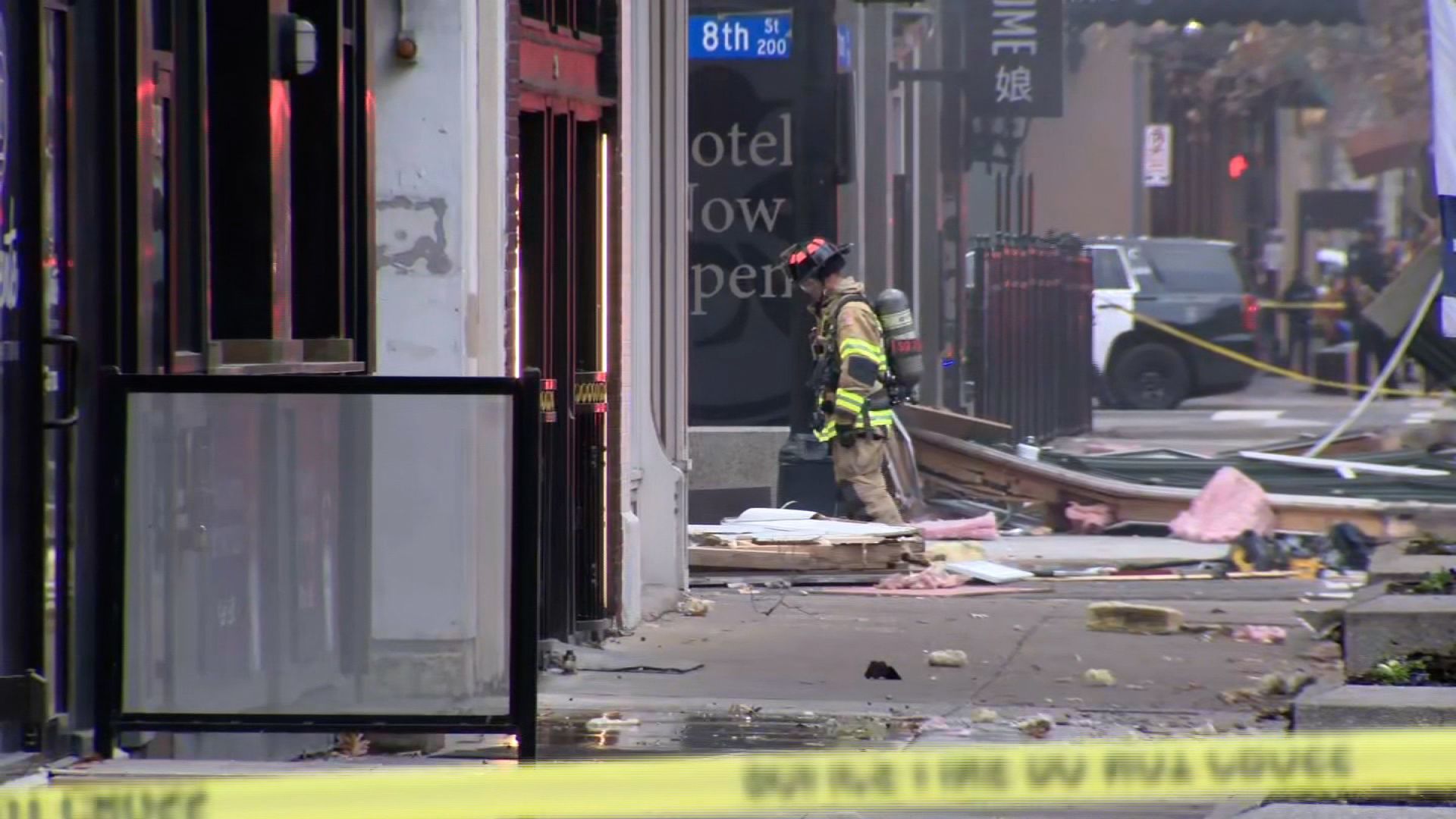 First responders are seen at the site of a hotel explosion in downtown Fort Worth, Texas, on Monday. The explosion littered downtown streets with large sections of building and debris and injured multiple people, authorities said.