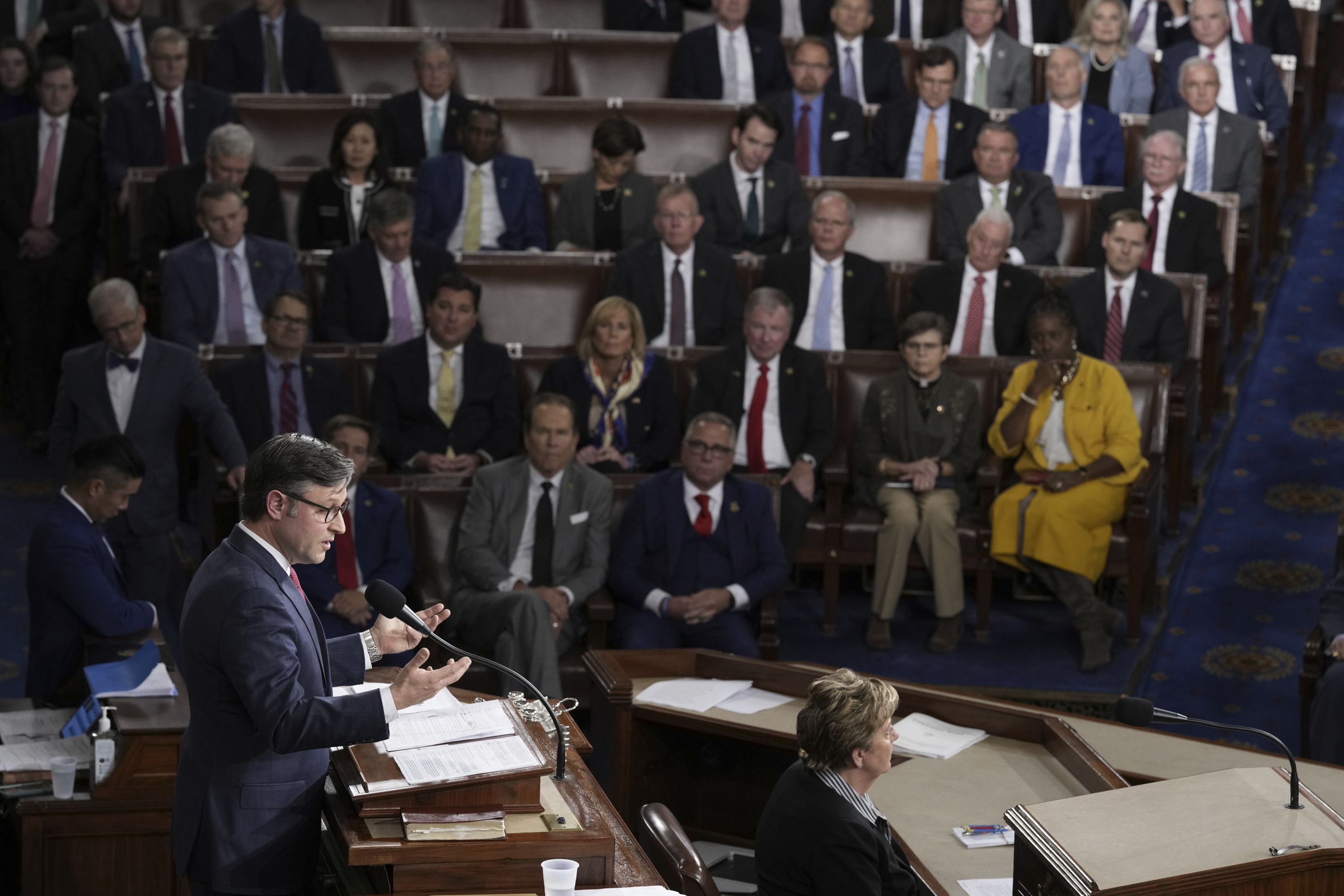 House Speaker-elect Rep. Mike Johnson, R-La., addresses members of Congress in Washington on Oct. 25, 2023. Congressional leaders have reached an agreement on topline spending levels for the current fiscal year 2024.