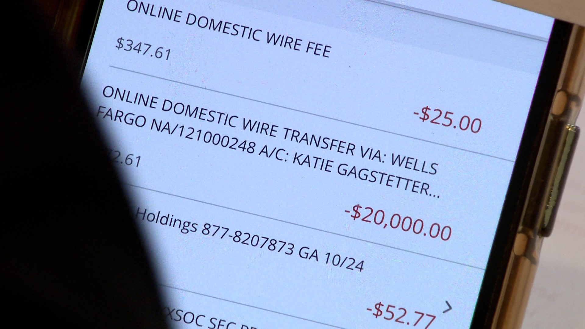 Kathryn England says an impostor tricked her into wiring $20,000. Then she hit a loophole in banking laws and lost the money.