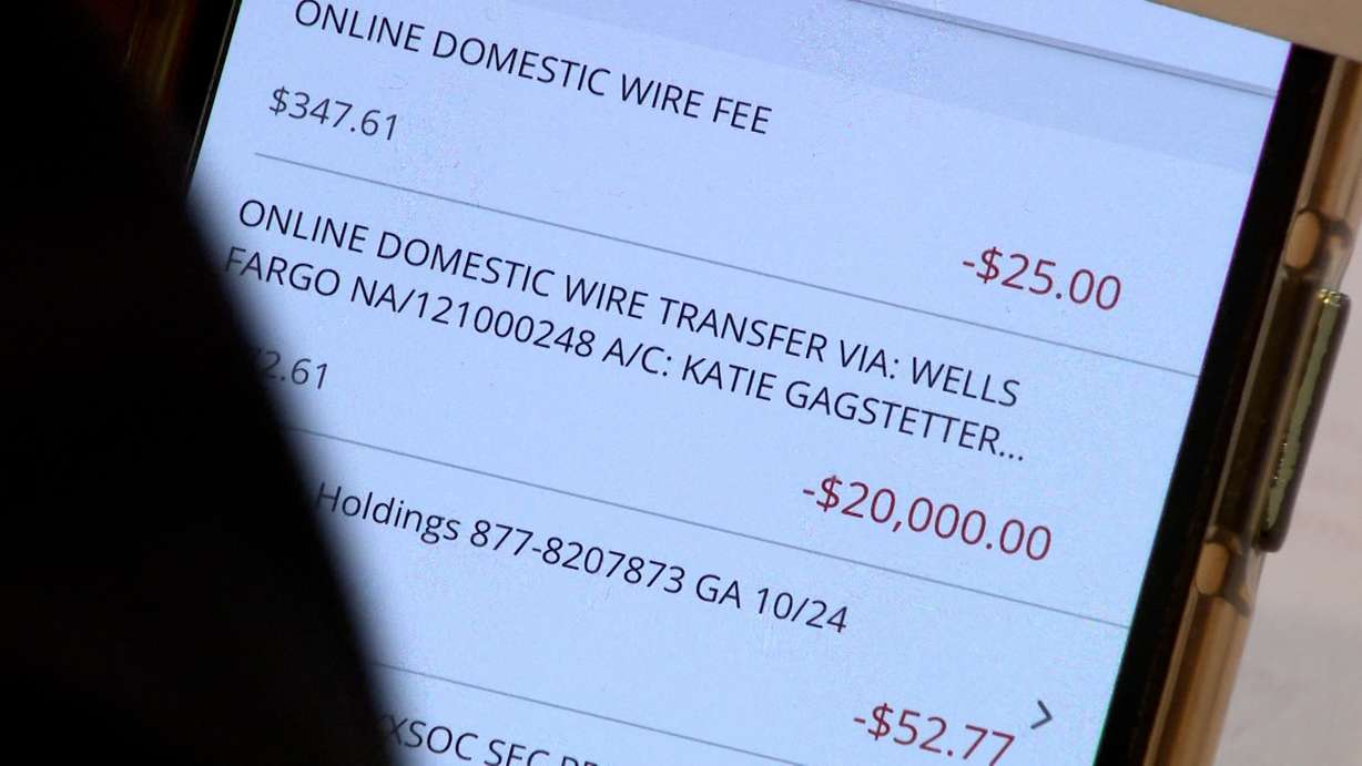 Kathryn England says an impostor tricked her into wiring $20,000. Then she hit a loophole in banking laws and lost the money.