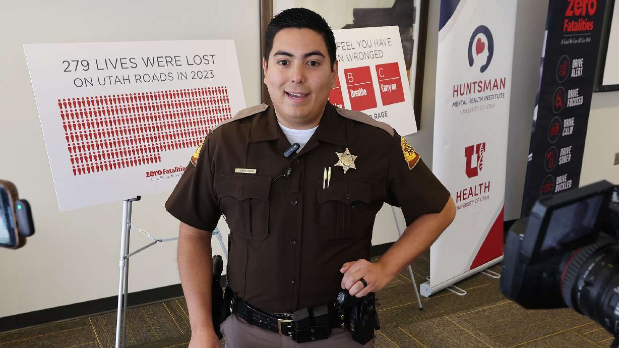 Utah Highway Patrol trooper Leonardo Flores is interviewed as the Utah Department of Transportation and the Department of Public Safety hold a press conference launching a new road rage campaign in Salt Lake City on Tuesday.