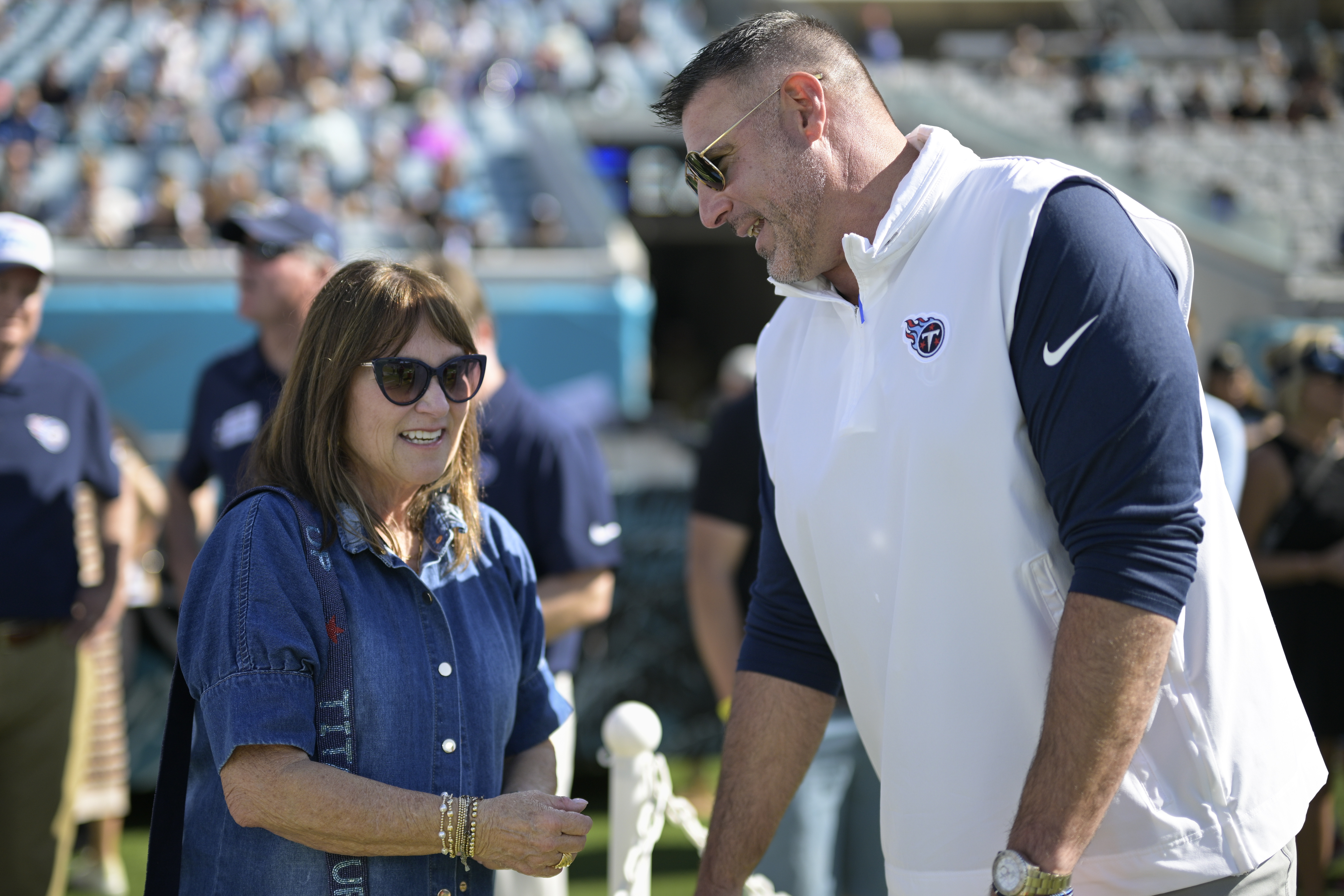 FILE - Tennessee Titans controlling owner Amy Adams Strunk talks with head coach Mike Vrabel before an NFL football game against the Jacksonville Jaguars, Sunday, Nov. 19, 2023, in Jacksonville, Fla. Strunk wants a fresh approach to compete in the NFL, so she fired coach Vrabel on Tuesday morning, Jan. 9, 2024, after six seasons and losing 18 of the past 24 games. 