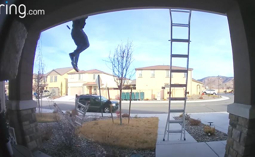A doorbell camera captured a man falling from a ladder while hanging Christmas lights Dec. 9.