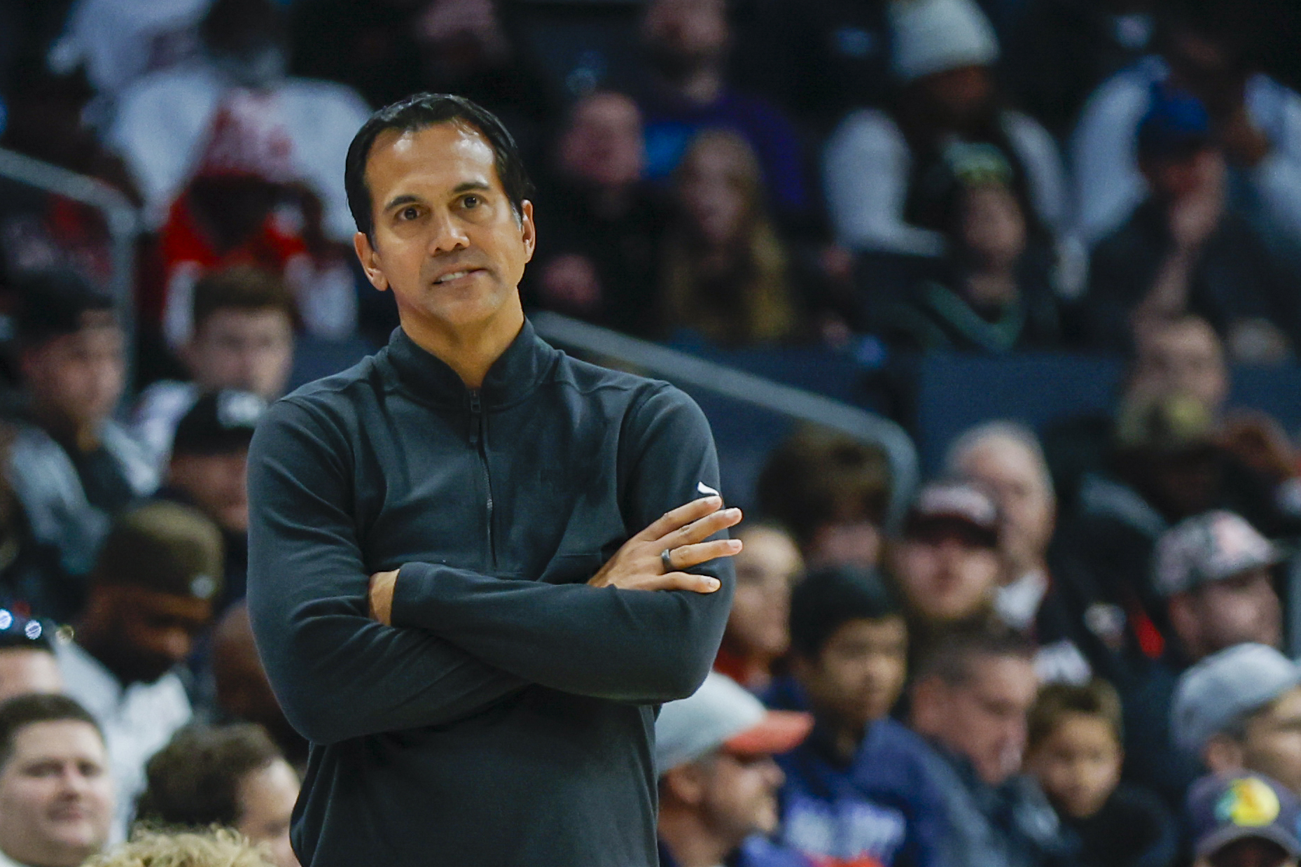 Miami Heat head coach Erik Spoelstra watches his team play against the Charlotte Hornets during the second half of an NBA basketball game in Charlotte, N.C., Monday, Dec. 11, 2023. 