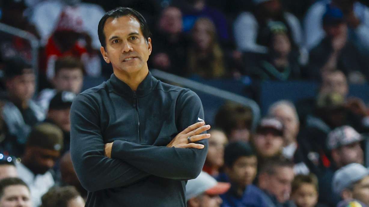 Miami Heat head coach Erik Spoelstra watches his team play against the Charlotte Hornets during the second half of an NBA basketball game in Charlotte, N.C., Monday, Dec. 11, 2023.