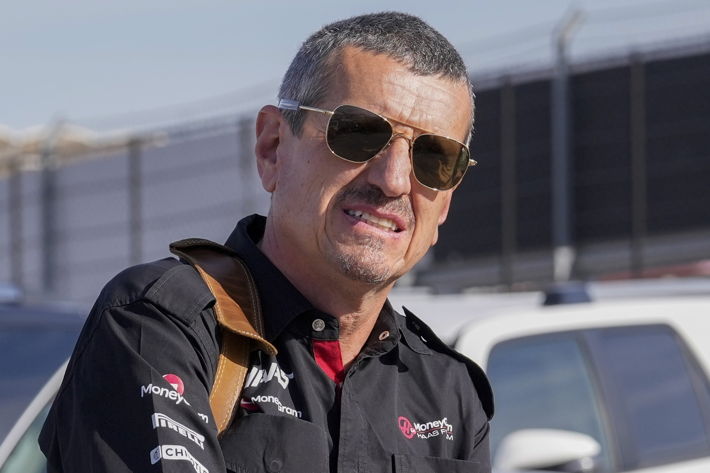 FILE - Guenther Steiner arrives before the sprint shootout ahead of the Formula One U.S. Grand Prix auto race at Circuit of the Americas, Saturday, Oct. 21, 2023, in Austin, Texas. Steiner, the first employee hired by Haas F1 and one of the stars of the Netflix docuseries on Formula One, has not been retained as team principal after a decade with the organization. Gene Haas made the announcement Wednesday, Jan. 10, 2024, and said director of engineering Ayo Komatsu, who started with Haas as chief race engineer in its 2016 debut season, will now oversee competition elements of the business as team principal.
