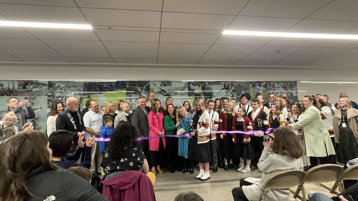 Davis School District employees, students and first lady Abby Cox at the Valhalla Student Center at Viewmont High School in Bountiful on Wednesday. The new student center will provide vital resources to students experiencing homelessness.