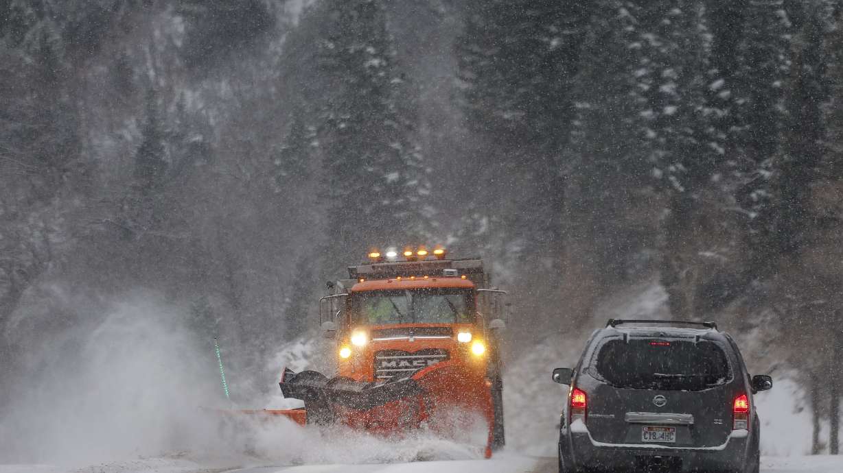A snowplow clears the road in Big Cottonwood Canyon on Dec. 1, 2023. Parts of Utah's mountains could receive 1 to 3 feet of snow or more from an incoming system, set to arrive as early as Thursday night and last into the weekend.