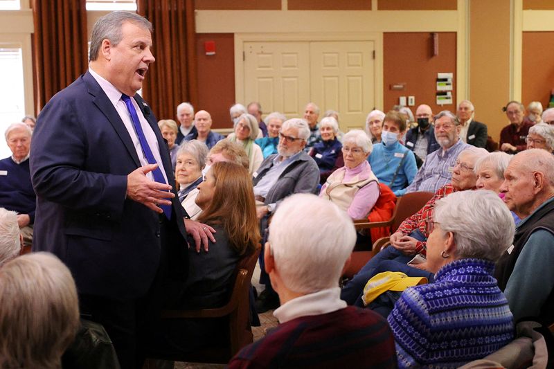 Republican presidential candidate and former New Jersey Gov. Chris Christie speaks at a campaign stop at the RiverWoods Retirement Community in Exeter, N.H., Wednesday.  He announced the end of his bid for the 2024 Republican presidential nomination.