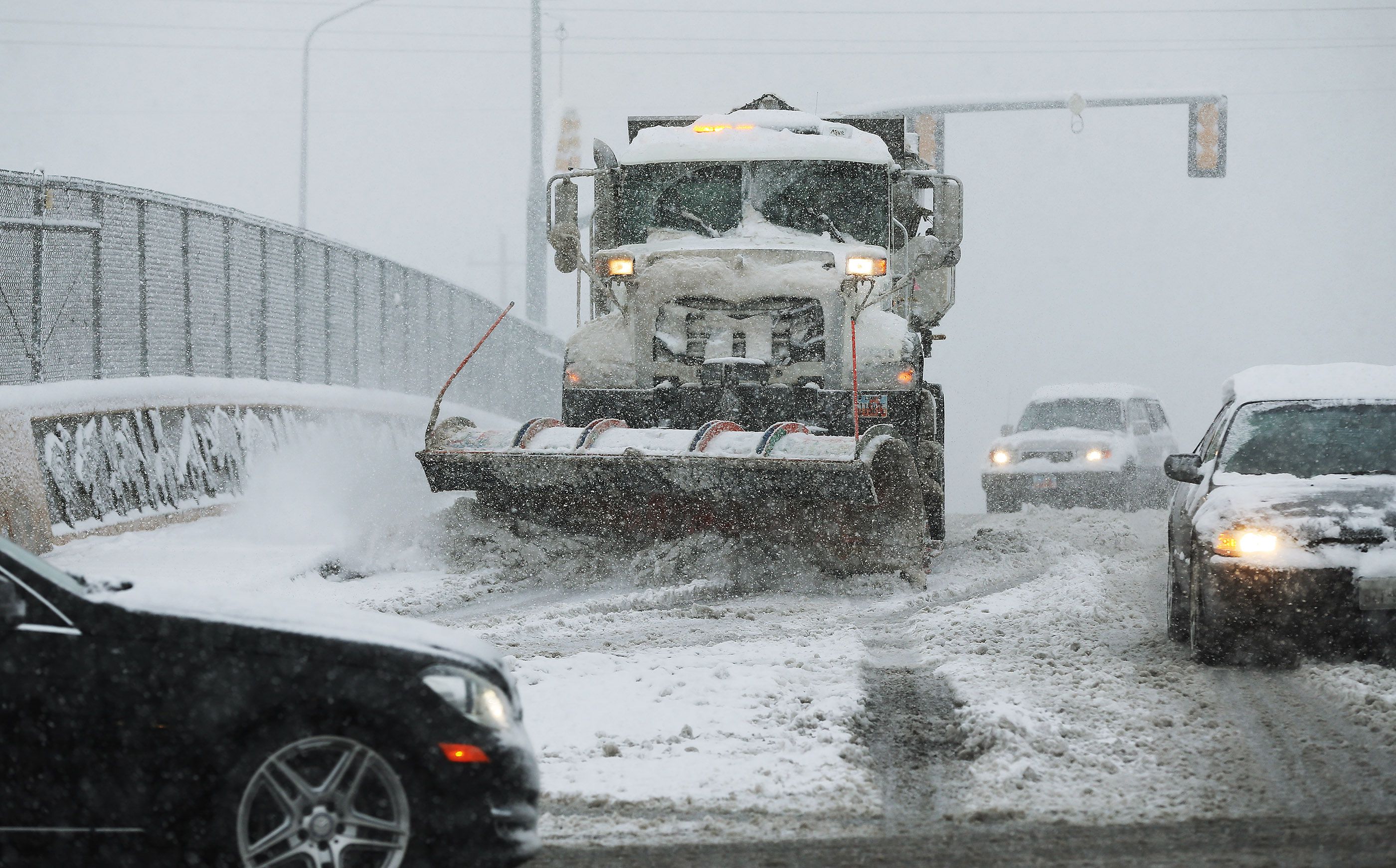 A plow clears snow in Salt Lake City, April 15, 2015. A raise is expected to affect a number of workers in Salt Lake City following the county's approval of Mayor Jenny Wilson's push to increase pay for "many hourly lower-grade employees." 
