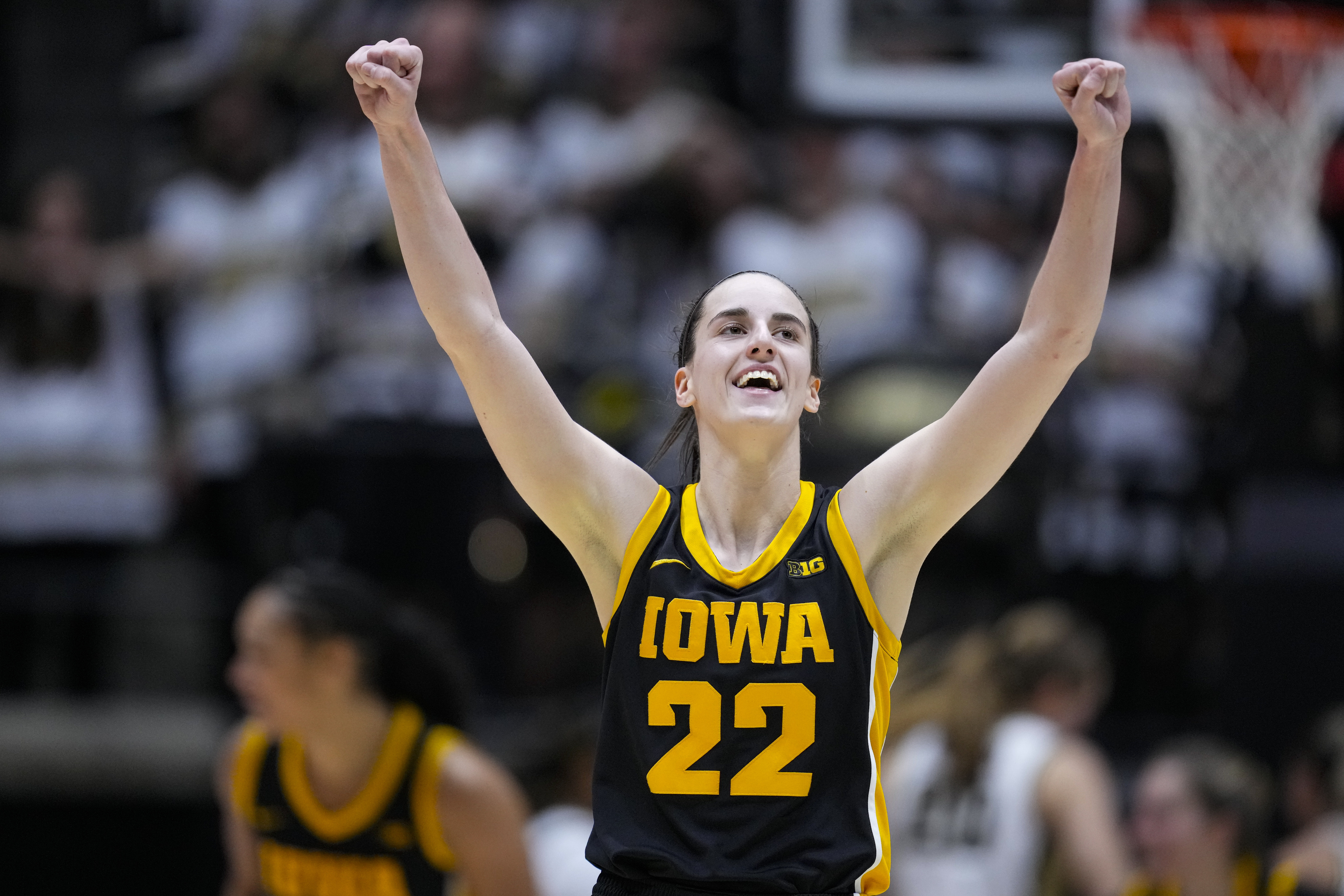 Iowa guard Caitlin Clark (22) celebrates in the second half of an NCAA college basketball game against the Purdue in West Lafayette, Ind., Wednesday, Jan. 10, 2024. Iowa defeated Purdue 96-71. 