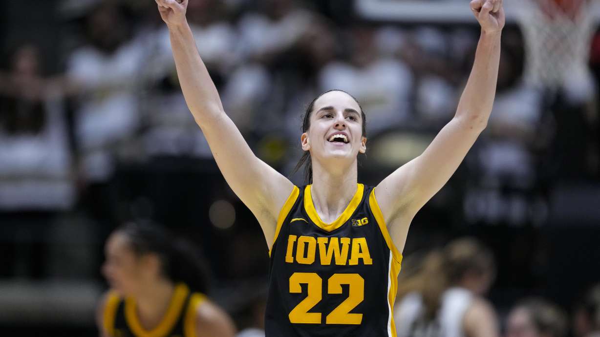 Iowa guard Caitlin Clark (22) celebrates in the second half of an NCAA college basketball game against the Purdue in West Lafayette, Ind., Wednesday, Jan. 10, 2024. Iowa defeated Purdue 96-71.