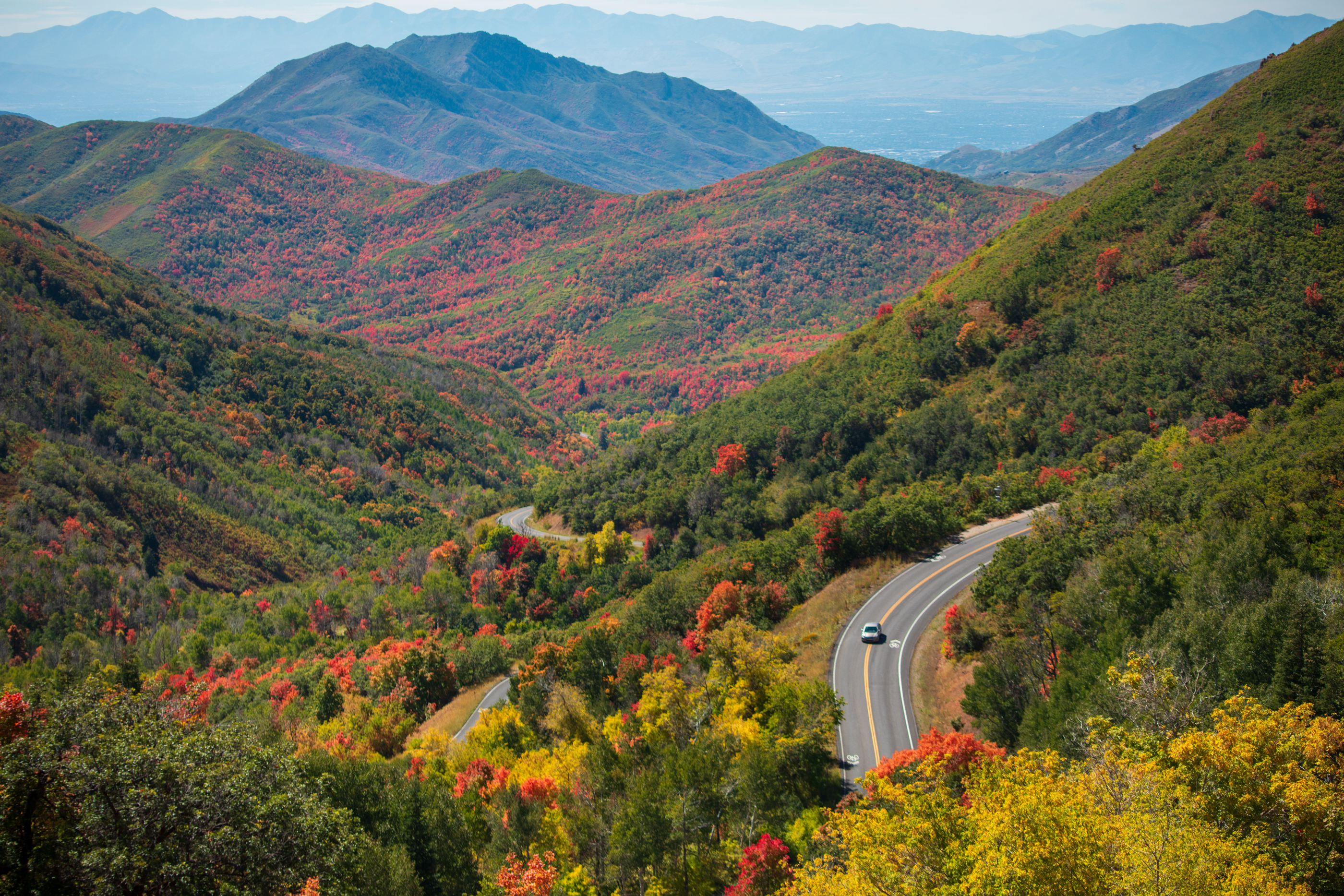 A car travels the Morgan-Parleys Scenic Byway between Salt Lake and Morgan counties on Sept. 23, 2023. The Utah Legislature will consider a bill this year to extend the state's scenic byway program.