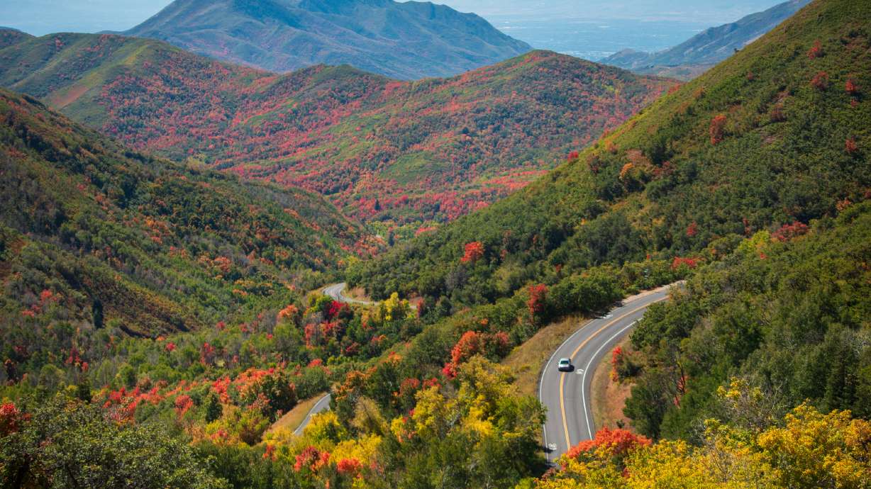 A car travels the Morgan-Parleys Scenic Byway between Salt Lake and Morgan counties on Sept. 23, 2023. The Utah Legislature will consider a bill this year to extend the state's scenic byway program.