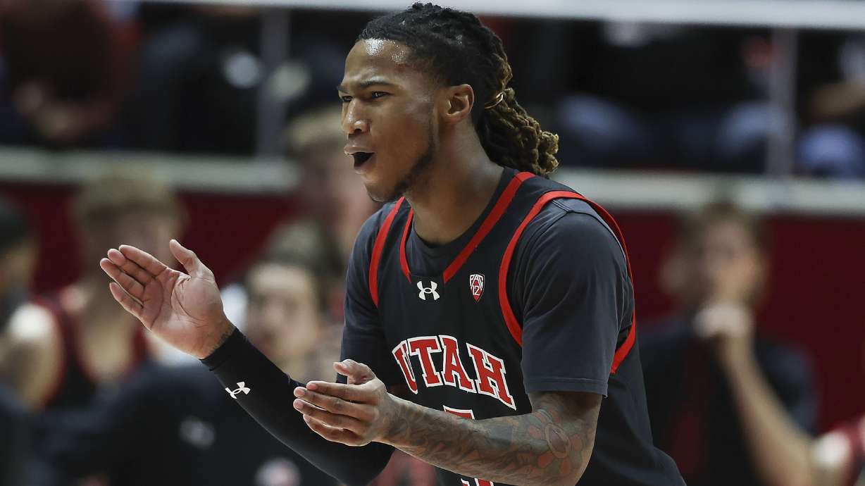 Utah Utes guard Deivon Smith (5) cheers during the game against UCLA at the University of Utah’s Huntsman Center in Salt Lake City on Thursday, Jan. 11, 2024.