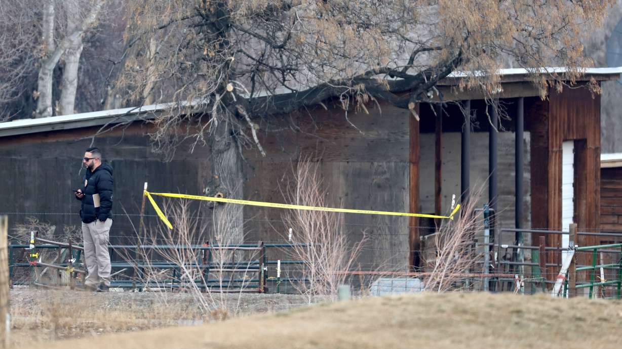 Police investigate a shooting in West Valley City, near Hunter High School on Jan. 13, 2022. The parents of Paul Tahi and Tivani Lopati are bringing a wrongful death lawsuit accusing the Granite School District of not preventing the shooting.
