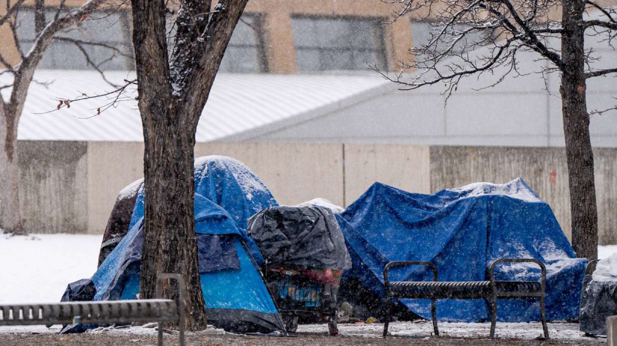 People experiencing homelessness camp outside the Main Library in Salt Lake City on Jan. 5.