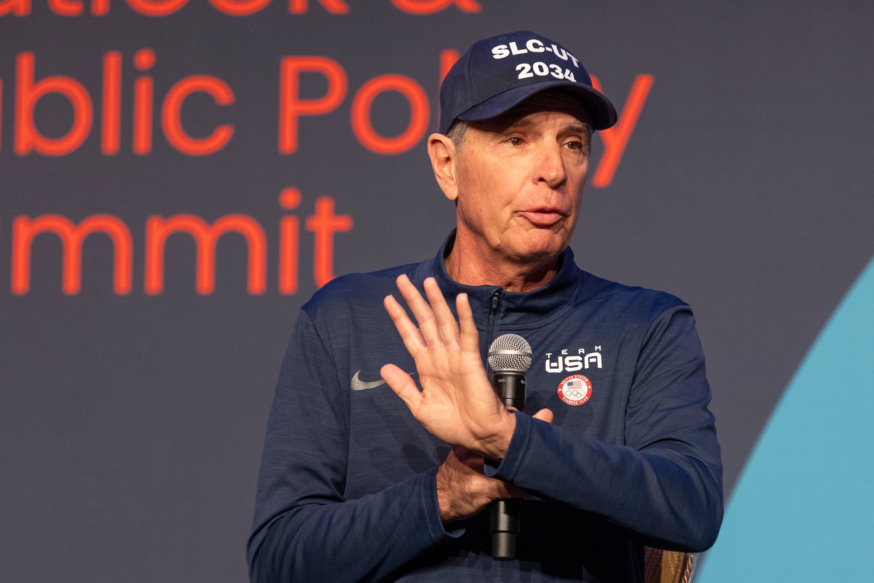 Fraser Bullock, president and CEO of the Salt Lake City-Utah Committee for the Games, speaks on the economic sporting vision panel at the 2024 Utah Economic Outlook and Public Policy Summit in Salt Lake City on Friday.