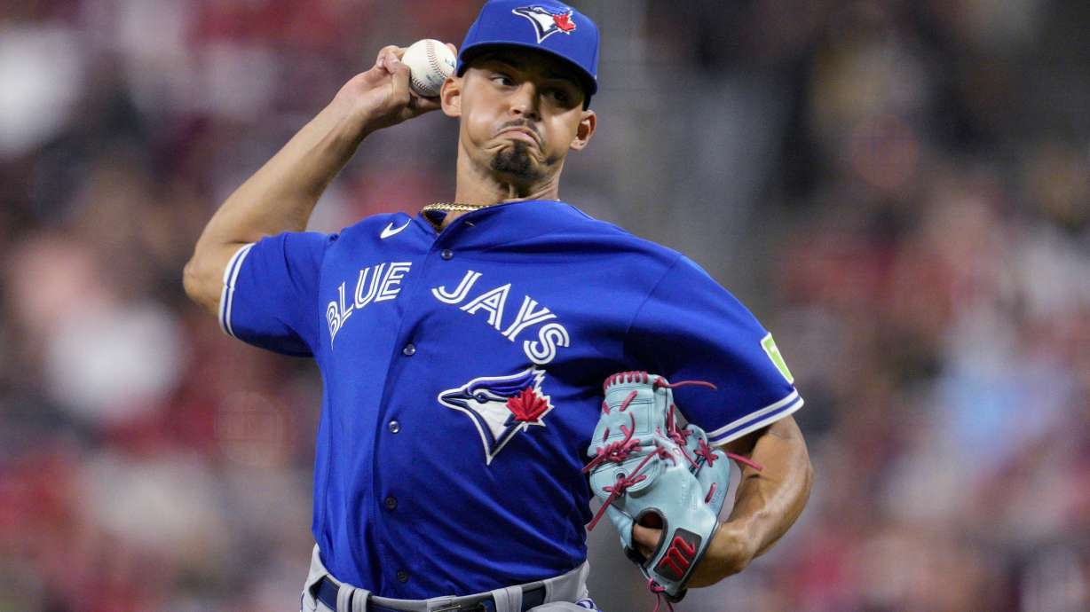 FILE - Toronto Blue Jays relief pitcher Jordan Hicks throws during the team's baseball game against the Cincinnati Reds in Cincinnati, Aug. 18, 2023. Hicks, a free agent, has reached agreement on a $44 million, four-year contract with the San Francisco Giants, a person with direct knowledge of the negotiations said Friday, Jan. 12, 2024. The person spoke on condition of anonymity because the deal still required a physical to be finalized.