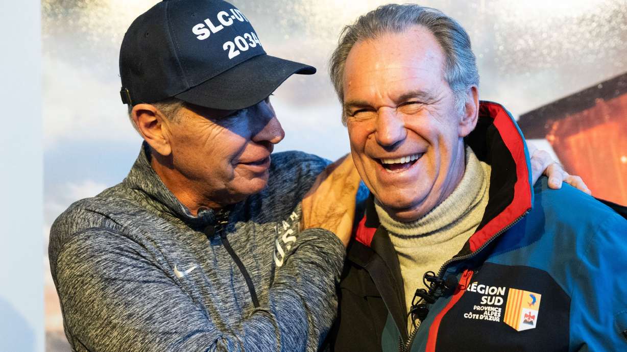 Fraser Bullock, left, CEO of the Salt Lake City-Utah Committee for the Games, and Provence-Alpes-Côte d’Azur Region President Renaud Muselier speak at the Alf Engen Ski Museum in Park City on Thursday.