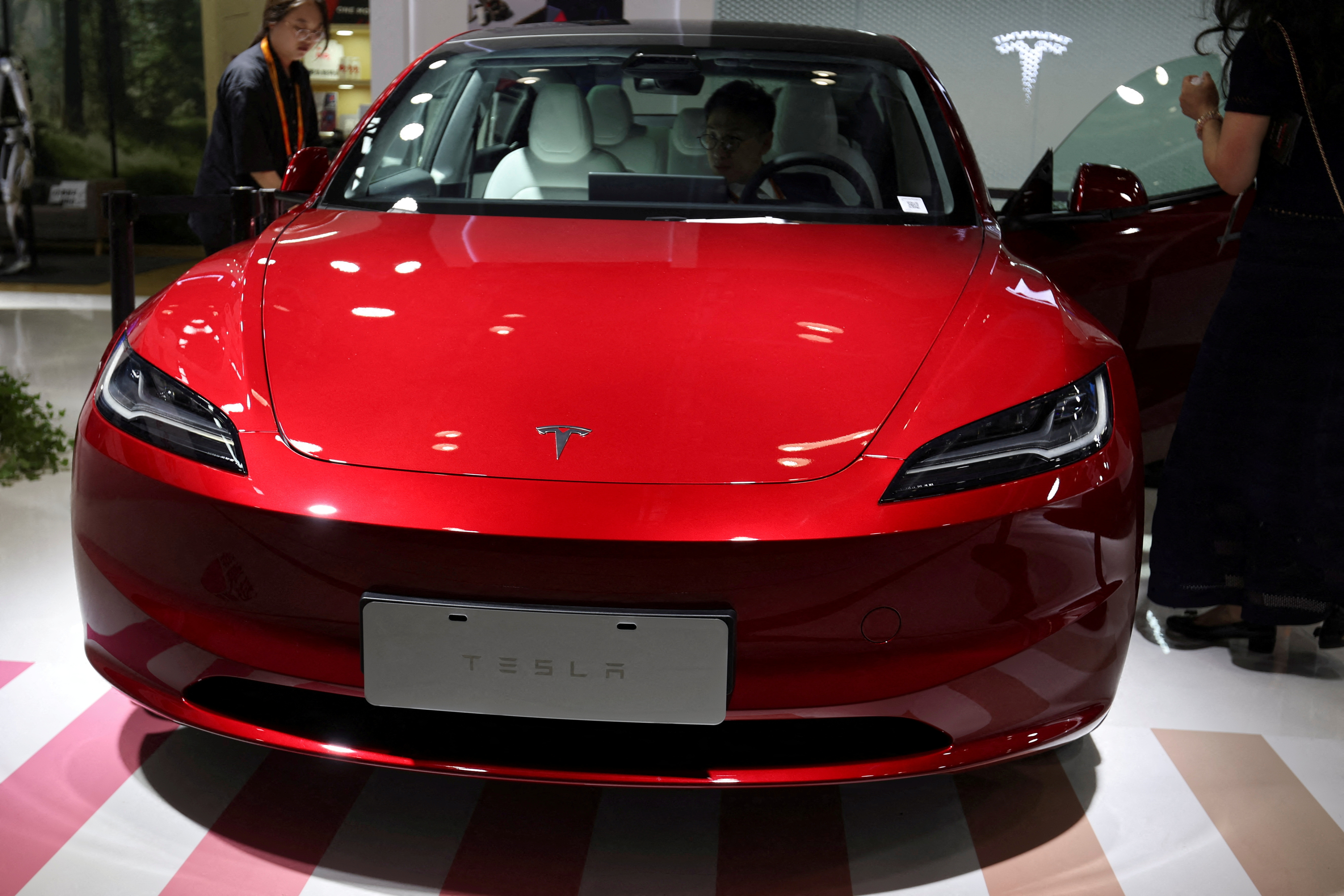 Tesla's new Model 3 sedan is displayed at the China International Fair for Trade in Services in Beijing, China Sept. 2, 2023.