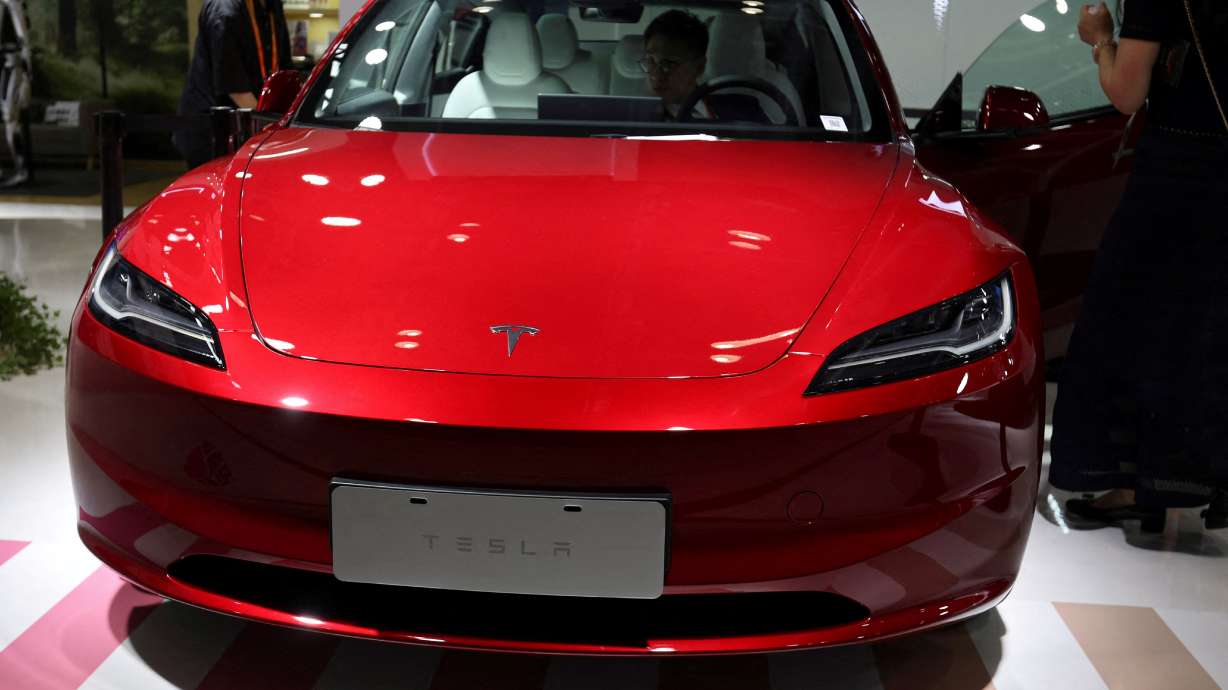 Tesla's new Model 3 sedan is displayed at the China International Fair for Trade in Services in Beijing, China Sept. 2, 2023.
