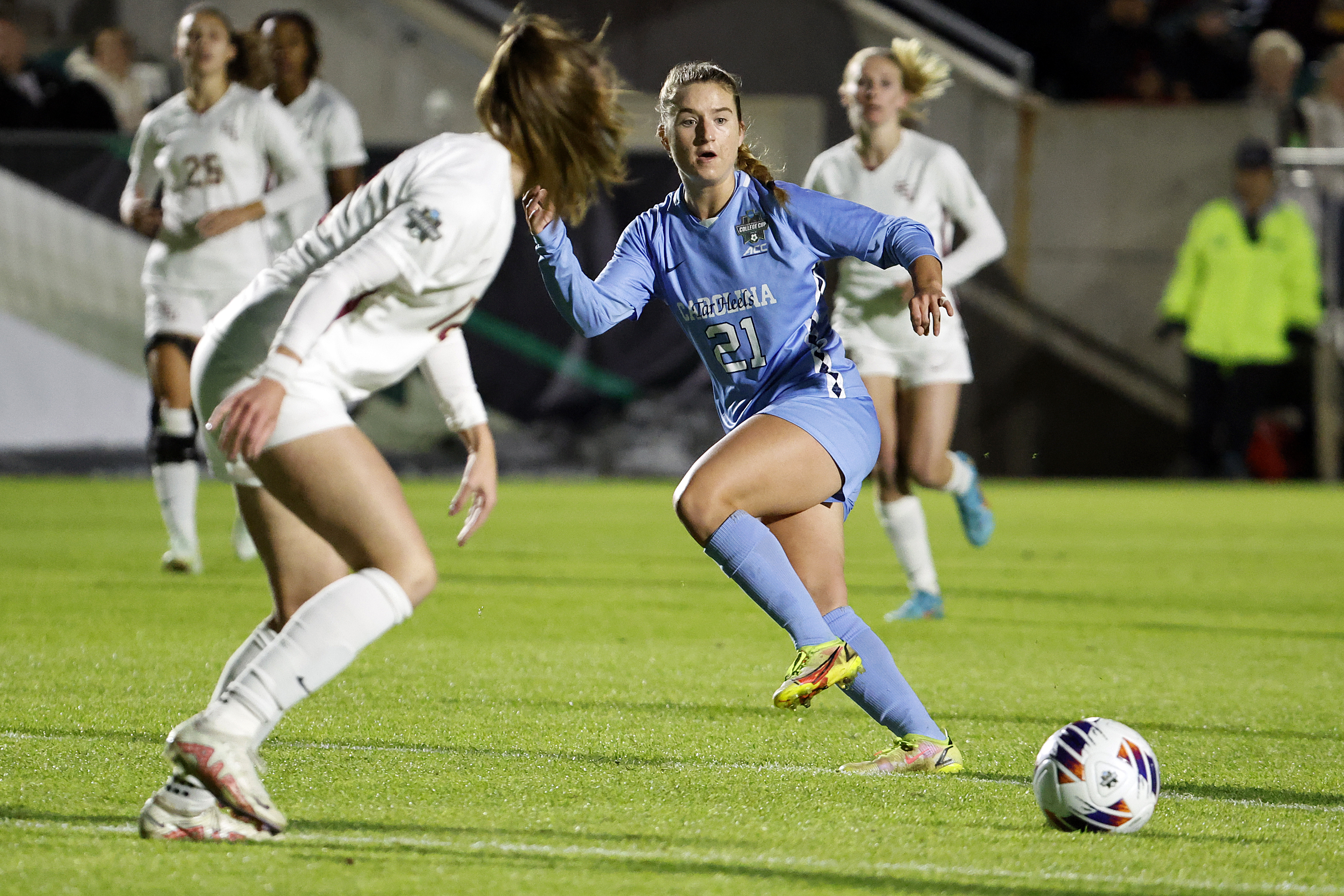 FILE - North Carolina's Ally Sentnor (21) passes the ball during the first half of the team's NCAA College Cup semifinal soccer match against Florida State in Cary, N.C., Dec. 2, 2022. Two players from North Carolina, Sentnor and Savy King, were selected with the top two picks in the National Women's Soccer League draft Friday night, Jan. 12, 2024. Sentnor, the ACC Midfielder of the Year, went with the No. 1 pick overall to the expansion Utah Royals. As a sophomore last year she had 11 goals and seven assists. 