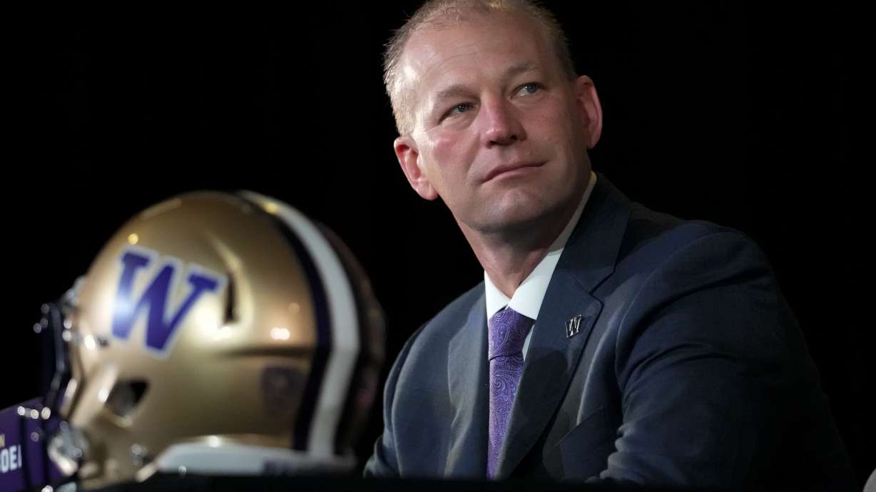 Washington head coach Kalen DeBoer speaks during a news conference ahead of the national championship NCAA College Football Playoff game between Washington and Michigan Sunday, Jan. 7, 2024, in Houston. The game will be played Monday.