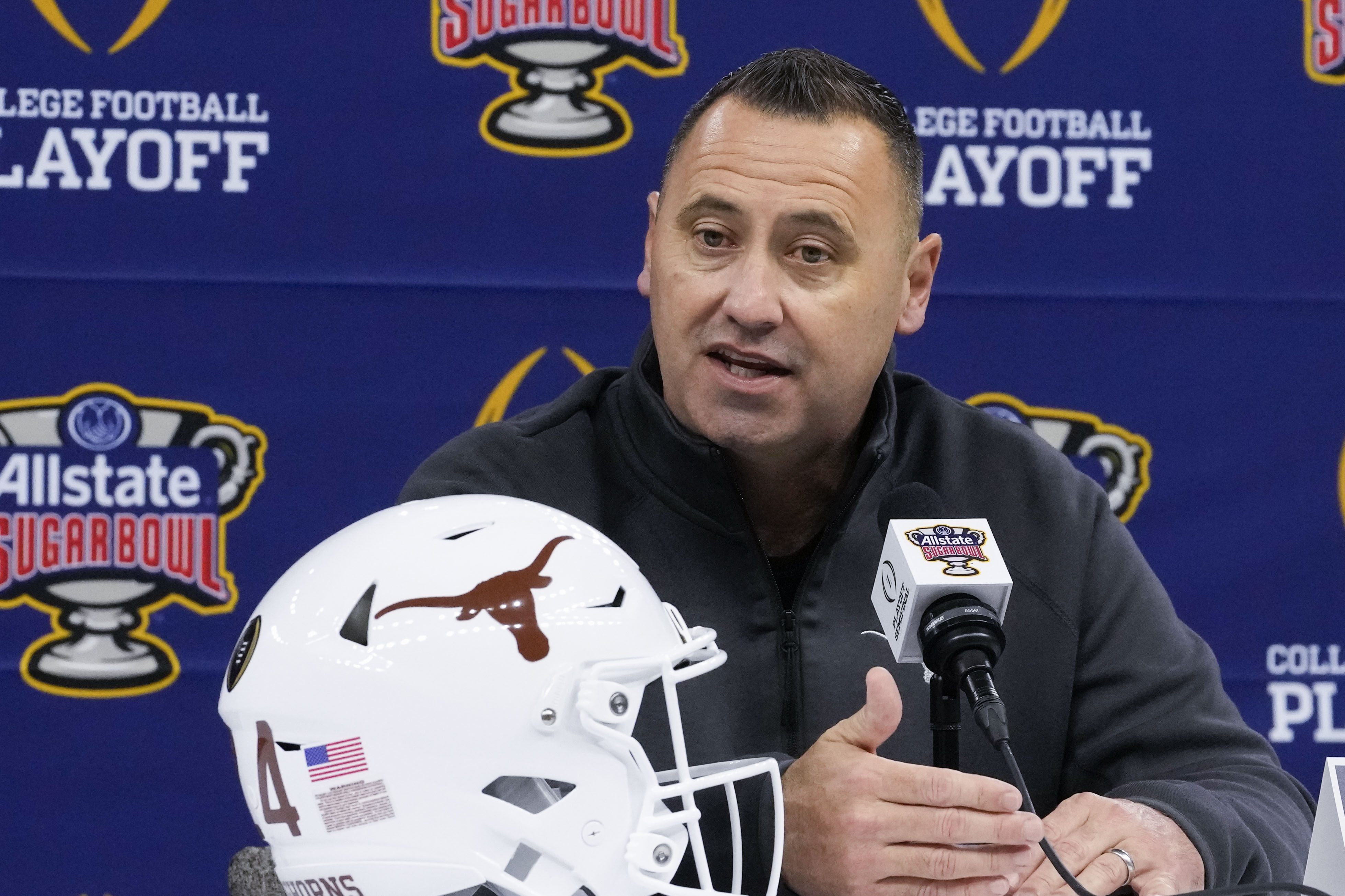 Texas head coach Steve Sarkisian speaks during media day for the the upcoming Sugar Bowl NCAA CFP college football semi-final game against Washington in New Orleans, Saturday, Dec. 30, 2023. 