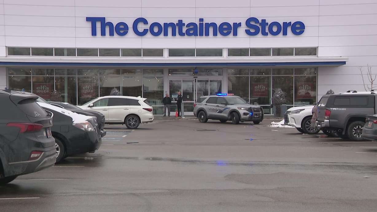 Police investigate a shooting that occurred outside The Container Store at Fashion Place Mall on Saturday.