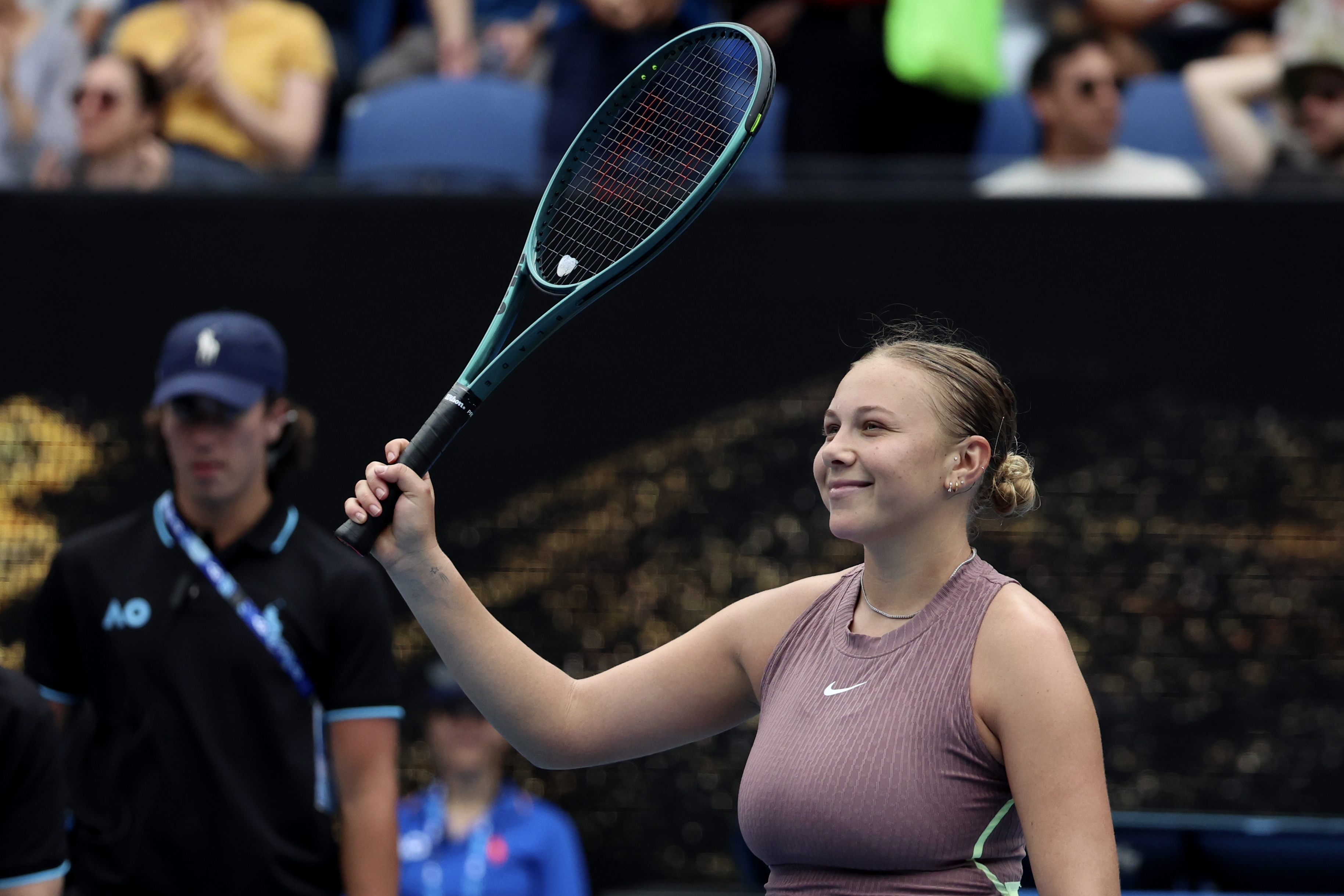 Amanda Anisimova of the U.S. reacts after defeating Liudmila Samsonova of Russia in their first round match at the Australian Open tennis championships at Melbourne Park, Melbourne, Australia, Sunday, Jan. 14, 2024. 