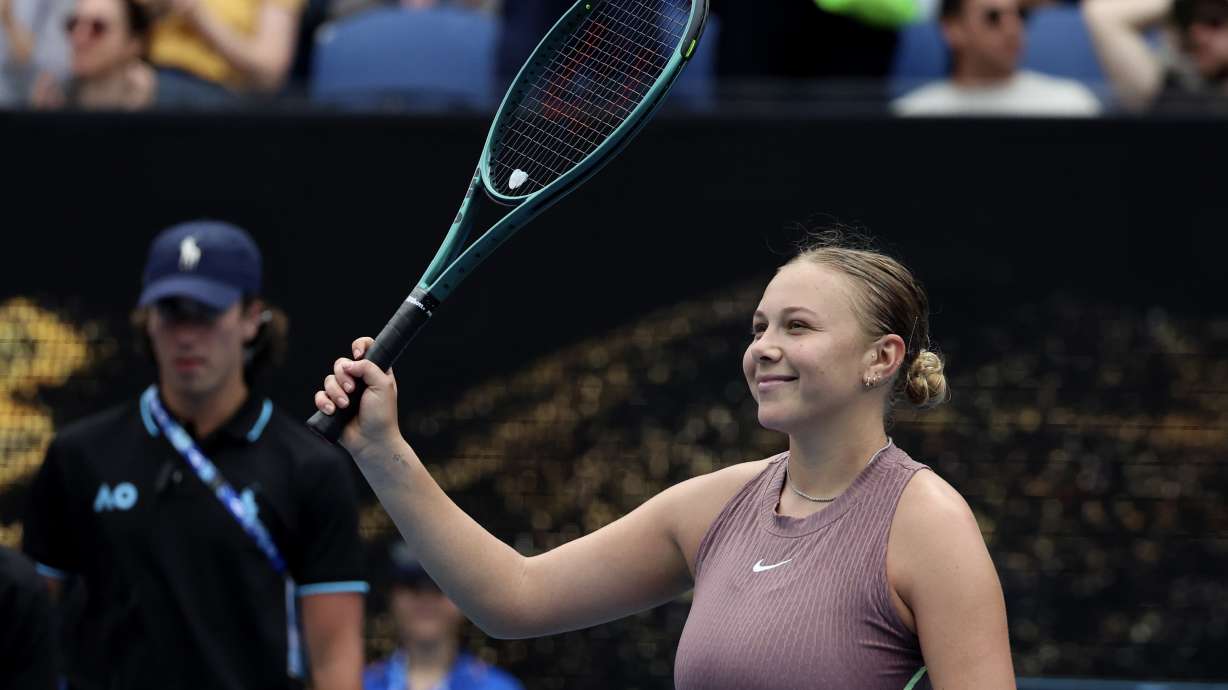 Amanda Anisimova of the U.S. reacts after defeating Liudmila Samsonova of Russia in their first round match at the Australian Open tennis championships at Melbourne Park, Melbourne, Australia, Sunday, Jan. 14, 2024.