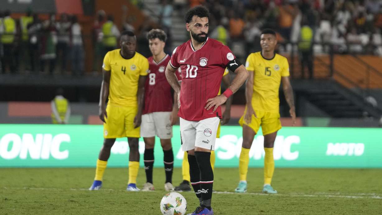Egypt's Mohamed Salah wait to take a penalty, which he scores for his side second goal of the game during the African Cup of Nations Group B soccer match between Egypt and Mozambique in Abidjan, Ivory Coast, Sunday, Jan. 14, 2024.