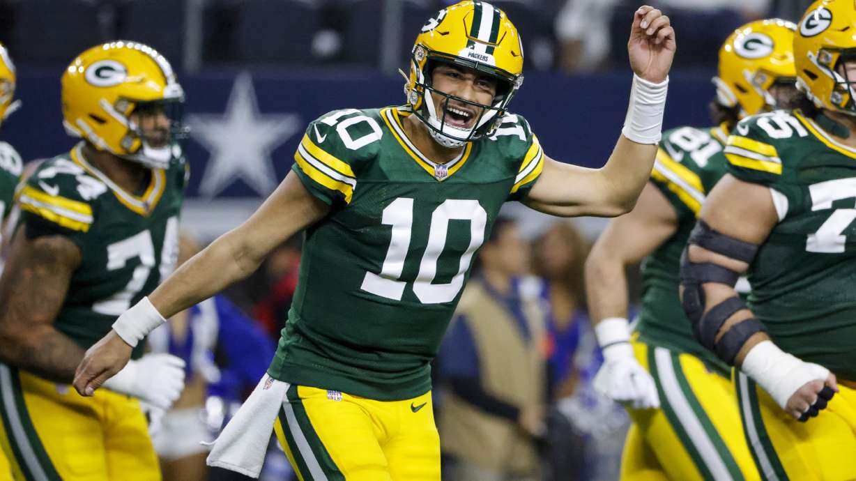 Green Bay Packers quarterback Jordan Love (10) reacts after throwing a touchdown pass against the Dallas Cowboys during the second half of an NFL football game, Sunday, Jan. 14, 2024, in Arlington, Texas.