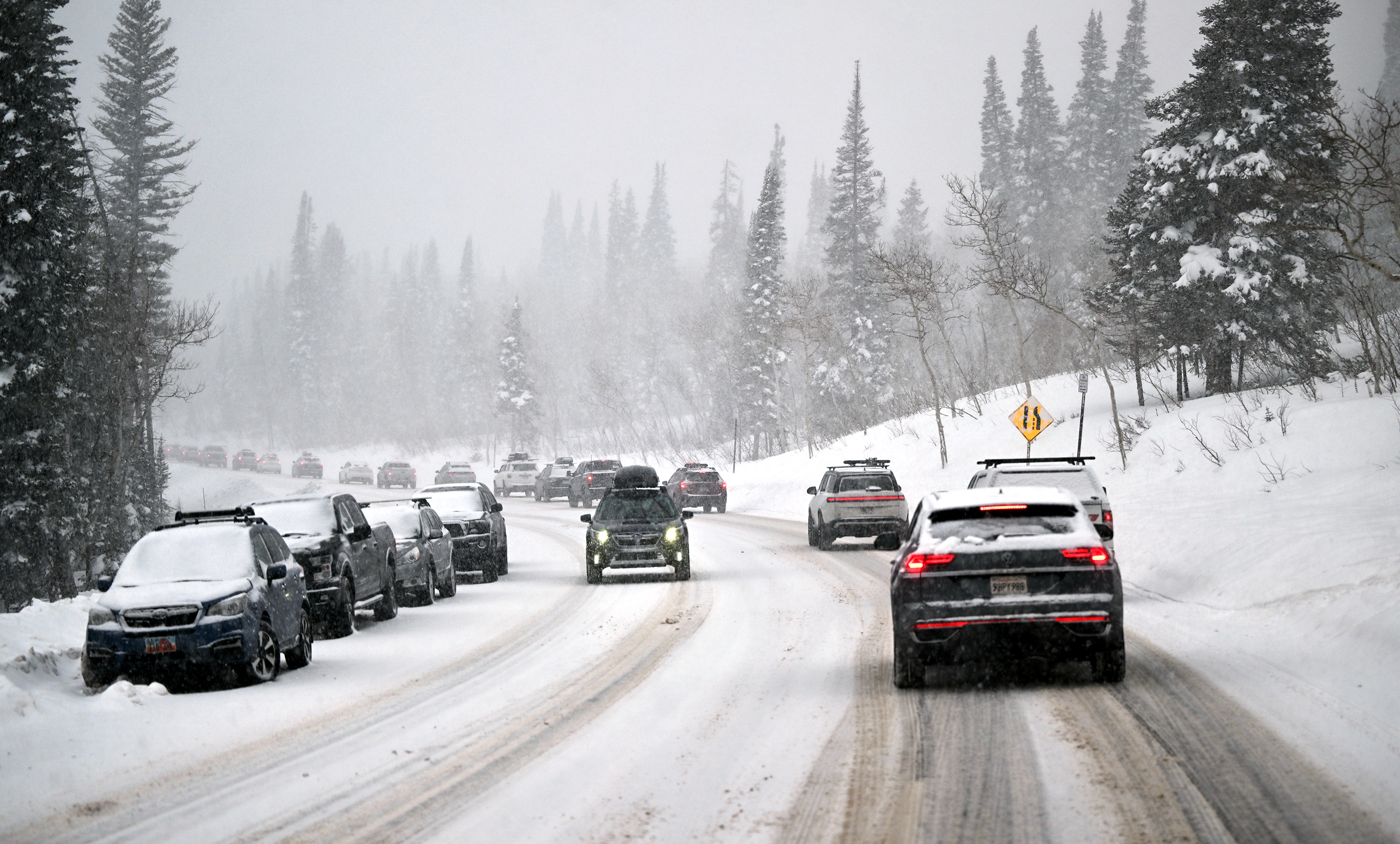 Traffic moves up and down Big Cottonwood Canyon Sunday. Little Cottonwood Canyon was closed Sunday, with Alta on interlodge, due to extreme avalanche danger.