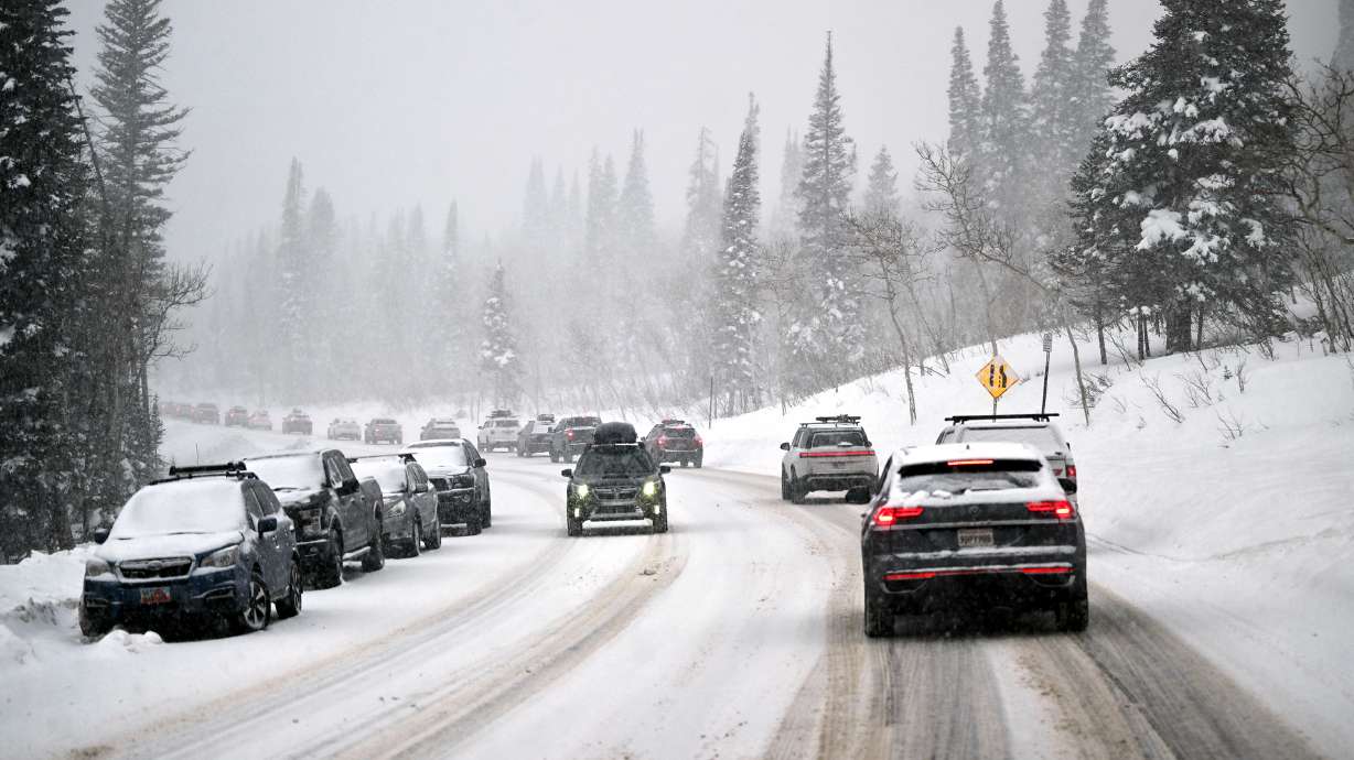Traffic moves up and down Big Cottonwood Canyon Sunday. Little Cottonwood Canyon was closed Sunday, with Alta on interlodge, due to extreme avalanche danger.