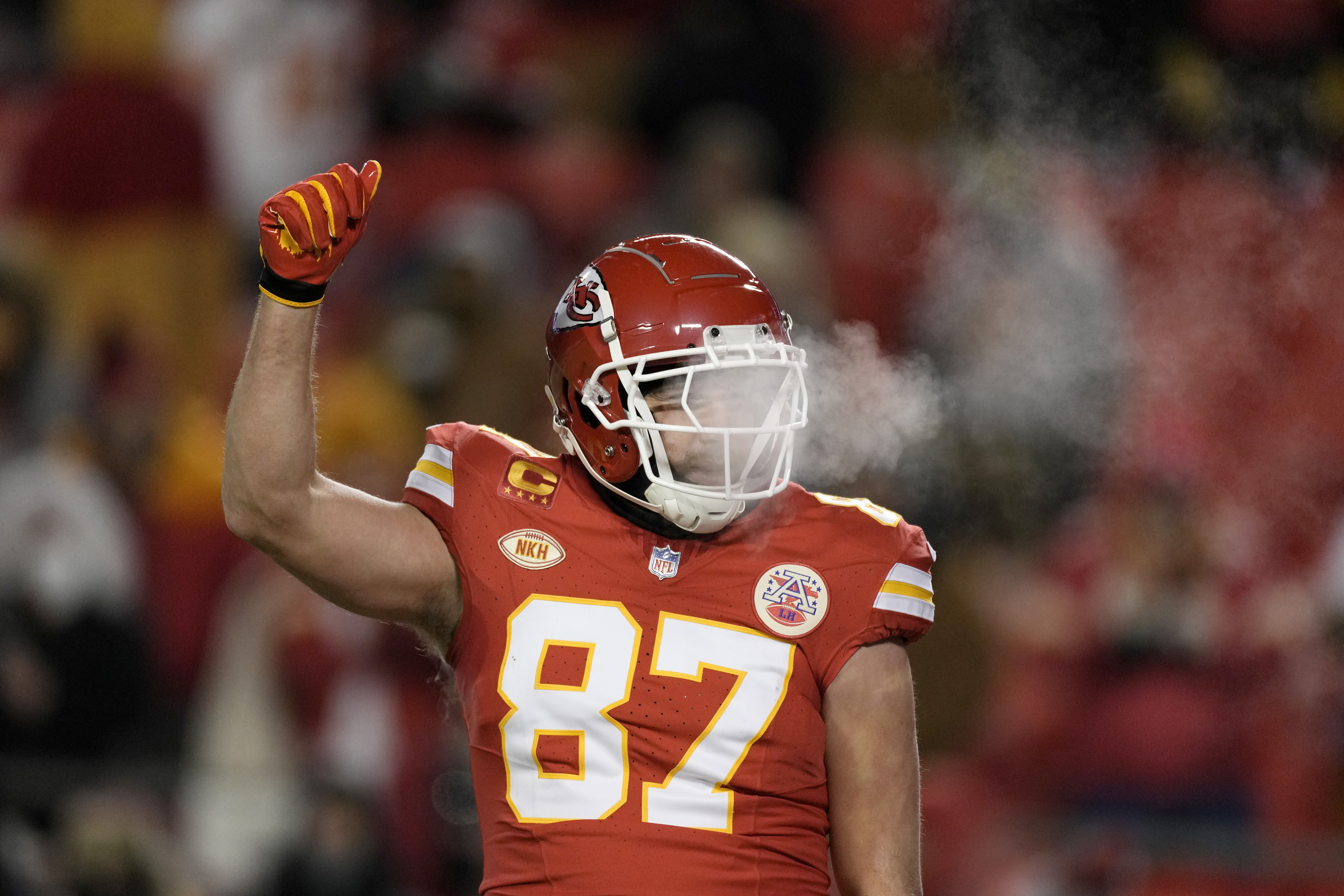 Kansas City Chiefs tight end Travis Kelce (87) warms up before an NFL wild-card playoff football game against the Miami Dolphins Saturday, Jan. 13, 2024, in Kansas City, Mo. 