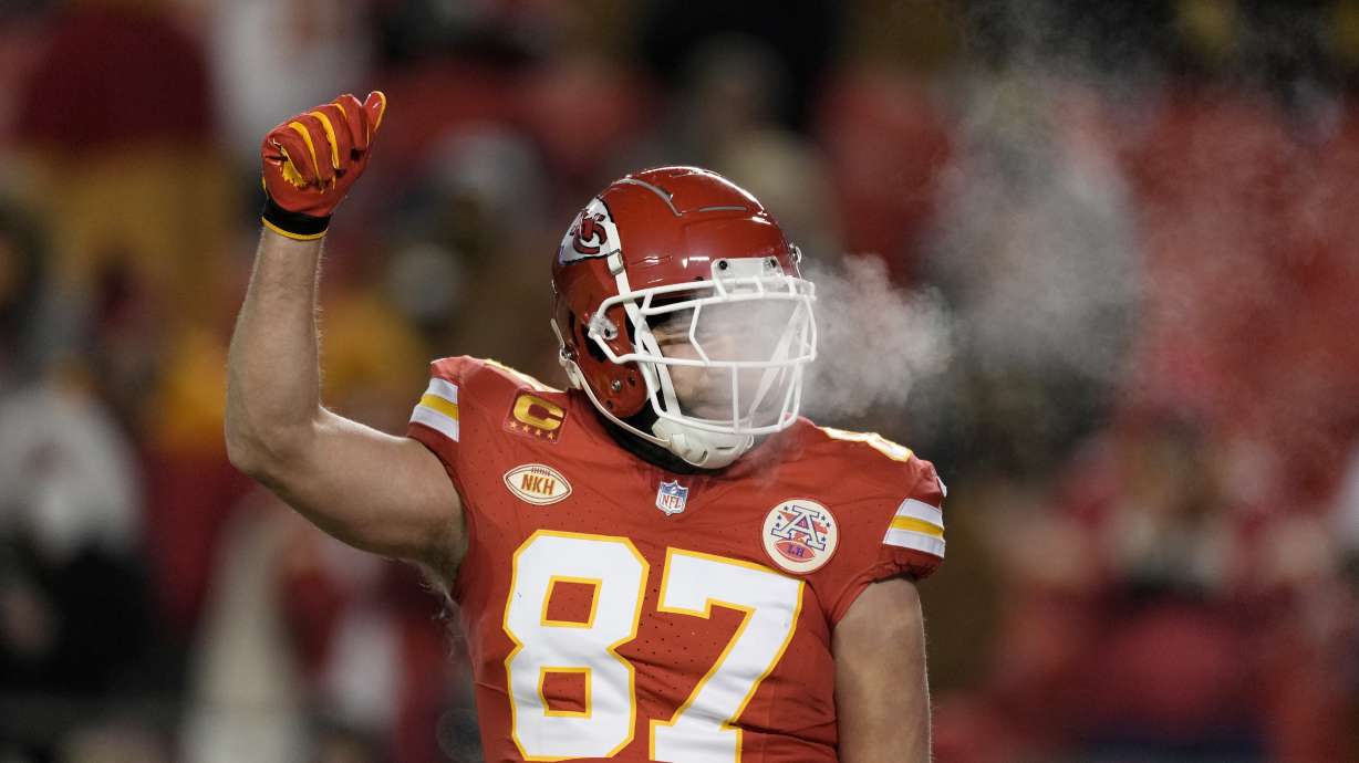 Kansas City Chiefs tight end Travis Kelce (87) warms up before an NFL wild-card playoff football game against the Miami Dolphins Saturday, Jan. 13, 2024, in Kansas City, Mo.