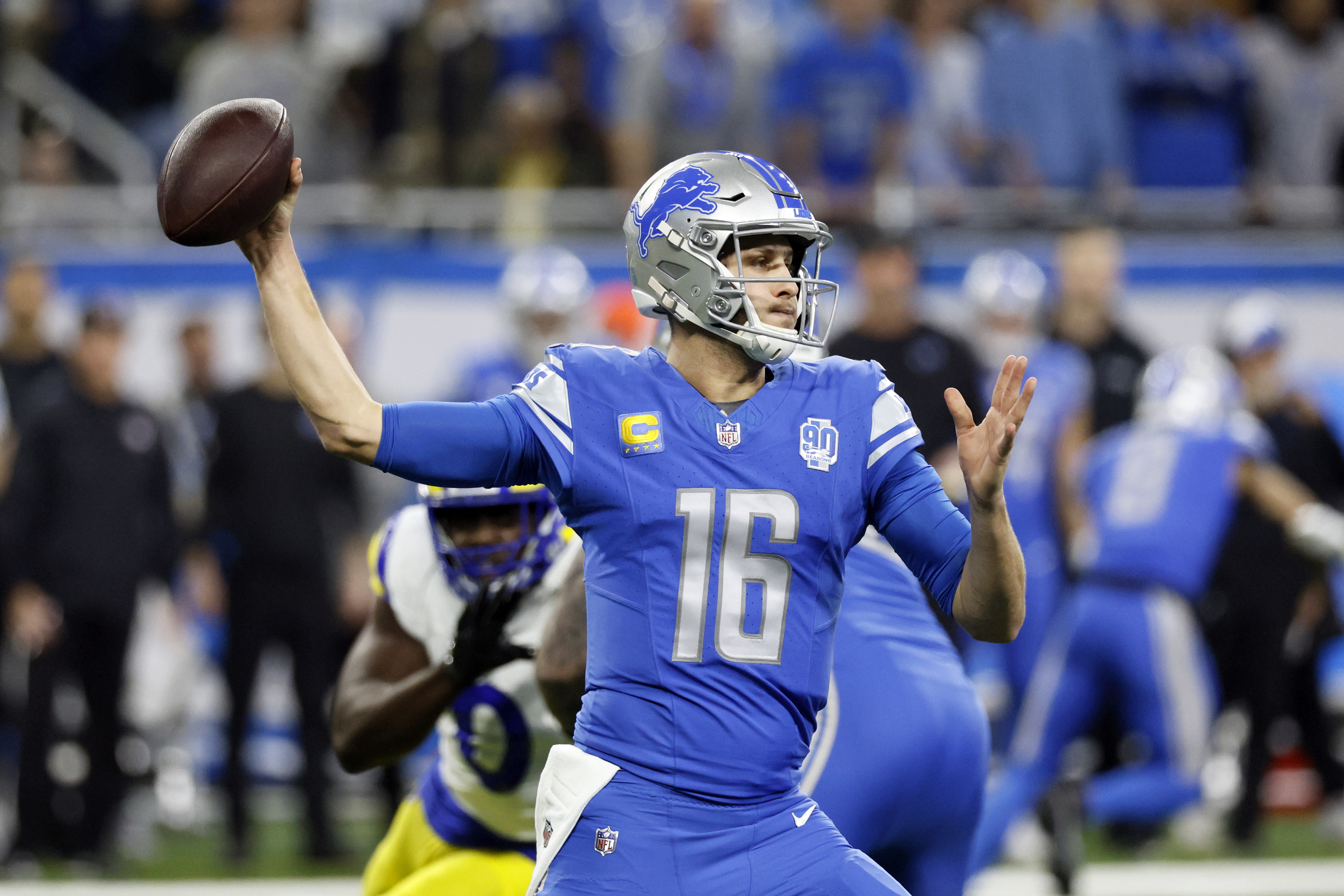 Detroit Lions quarterback Jared Goff throws during the first half of an NFL wild-card playoff football game against the Los Angeles Rams, Sunday, Jan. 14, 2024, in Detroit.