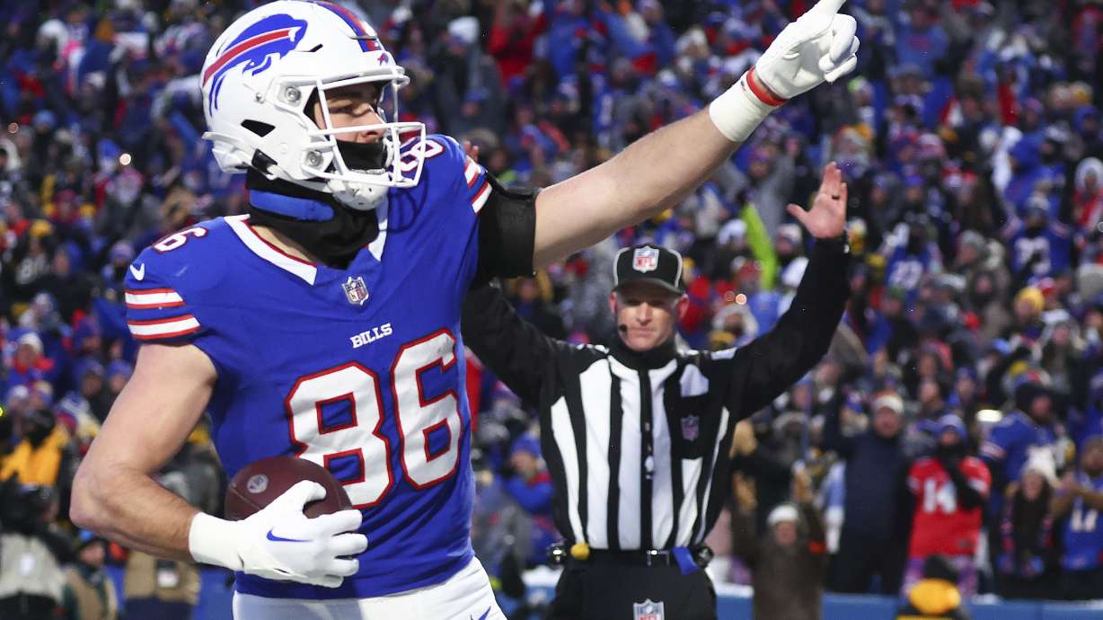 Buffalo Bills tight end Dalton Kincaid (86) reacts after scoring a touchdown against the Pittsburgh Steelers during the first quarter of an NFL wild-card playoff football game, Monday, Jan. 15, 2024, in Buffalo, N.Y.