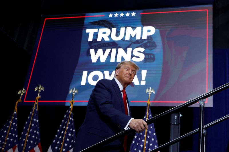 Former President Donald Trump takes the stage during his Iowa caucus night watch party in Des Moines, Iowa, Monday. Trump secured a resounding victory in the first 2024 Republican presidential contest in Iowa on Monday.