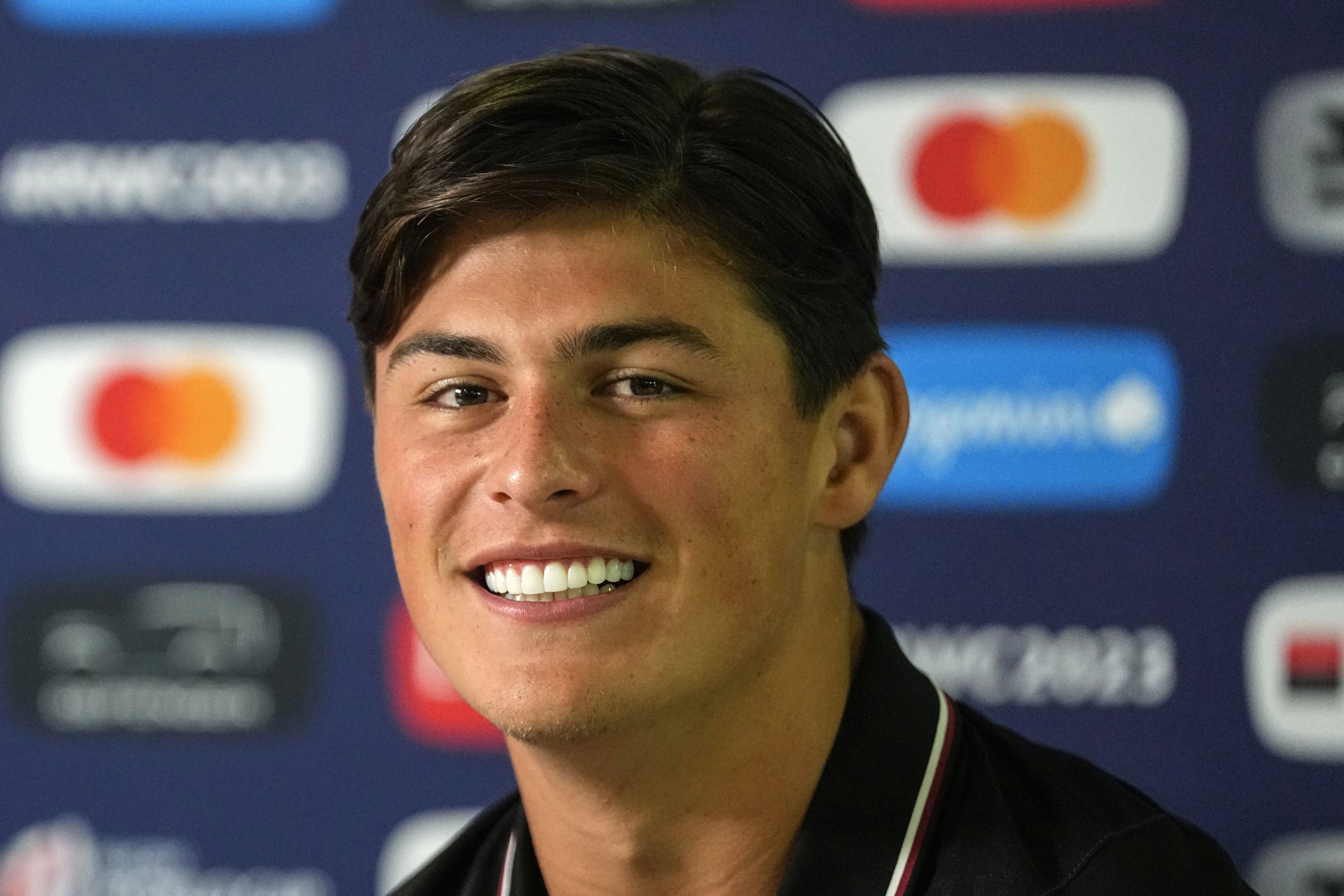FILE - Wales' Louis Rees-Zammit smiles during a news conference in Toulon, France, Thursday, Oct. 12, 2023. Wales rugby international Louis Rees-Zammit, one of the world's most exciting wingers, is quitting the sport to pursue his dream of playing the NFL.