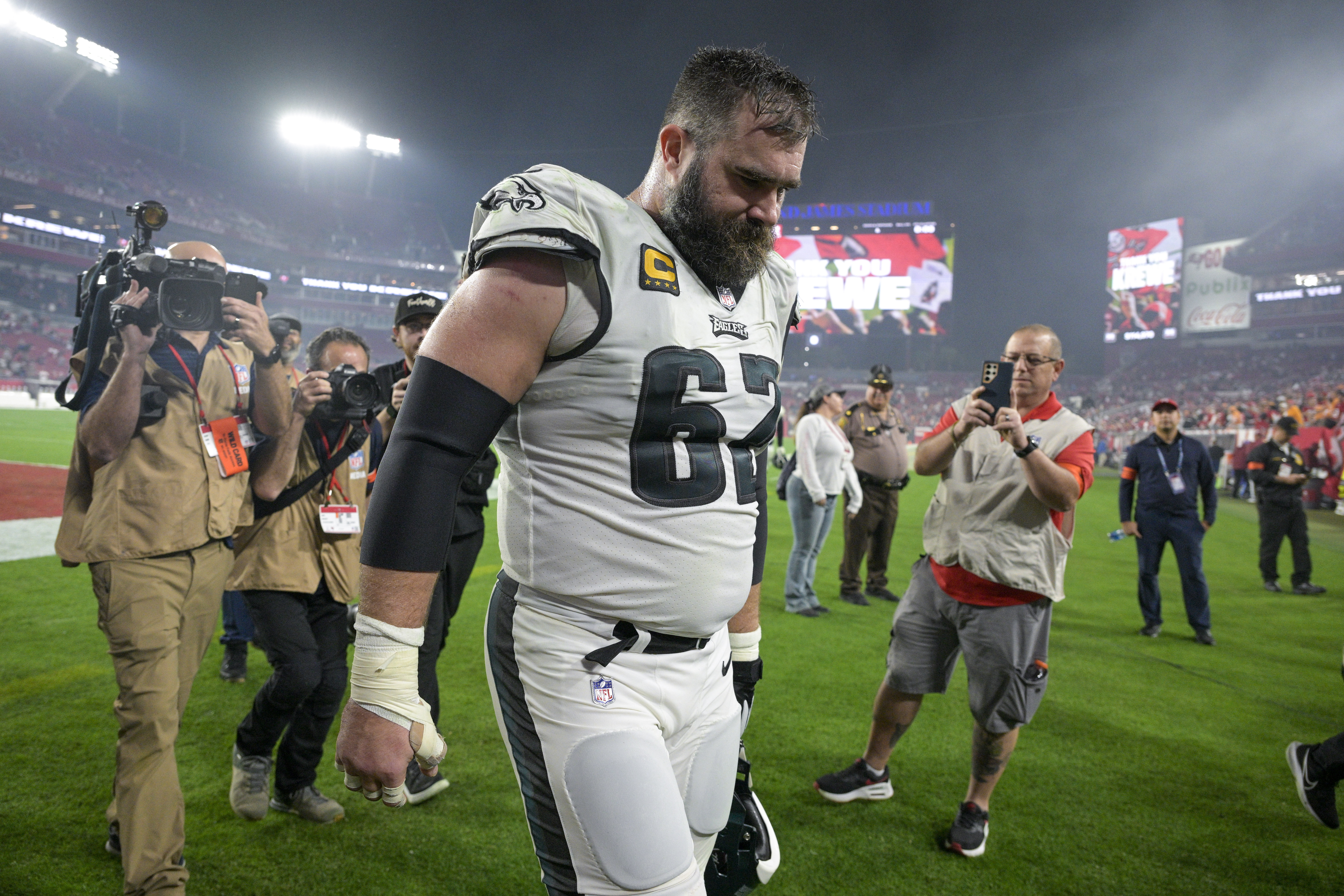 Philadelphia Eagles center Jason Kelce walks off the field following an NFL wild-card playoff football game against the Tampa Bay Buccaneers, Monday, Jan. 15, 2024, in Tampa, Fla. The Buccaneers won 32-9.