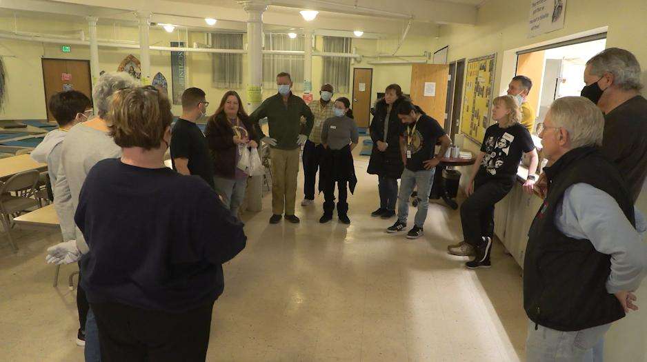 Wendy Garvin talks with volunteers ahead of opening the emergency shelter at First United Methodist Church on Monday in Salt Lake City.
