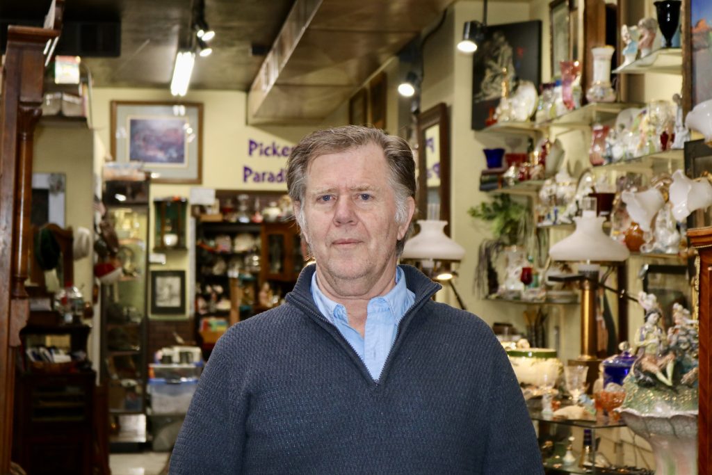 Main Street Antiques owner Jerry Christensen stands inside his vintage store in St. George, Jan. 10, 2023.
