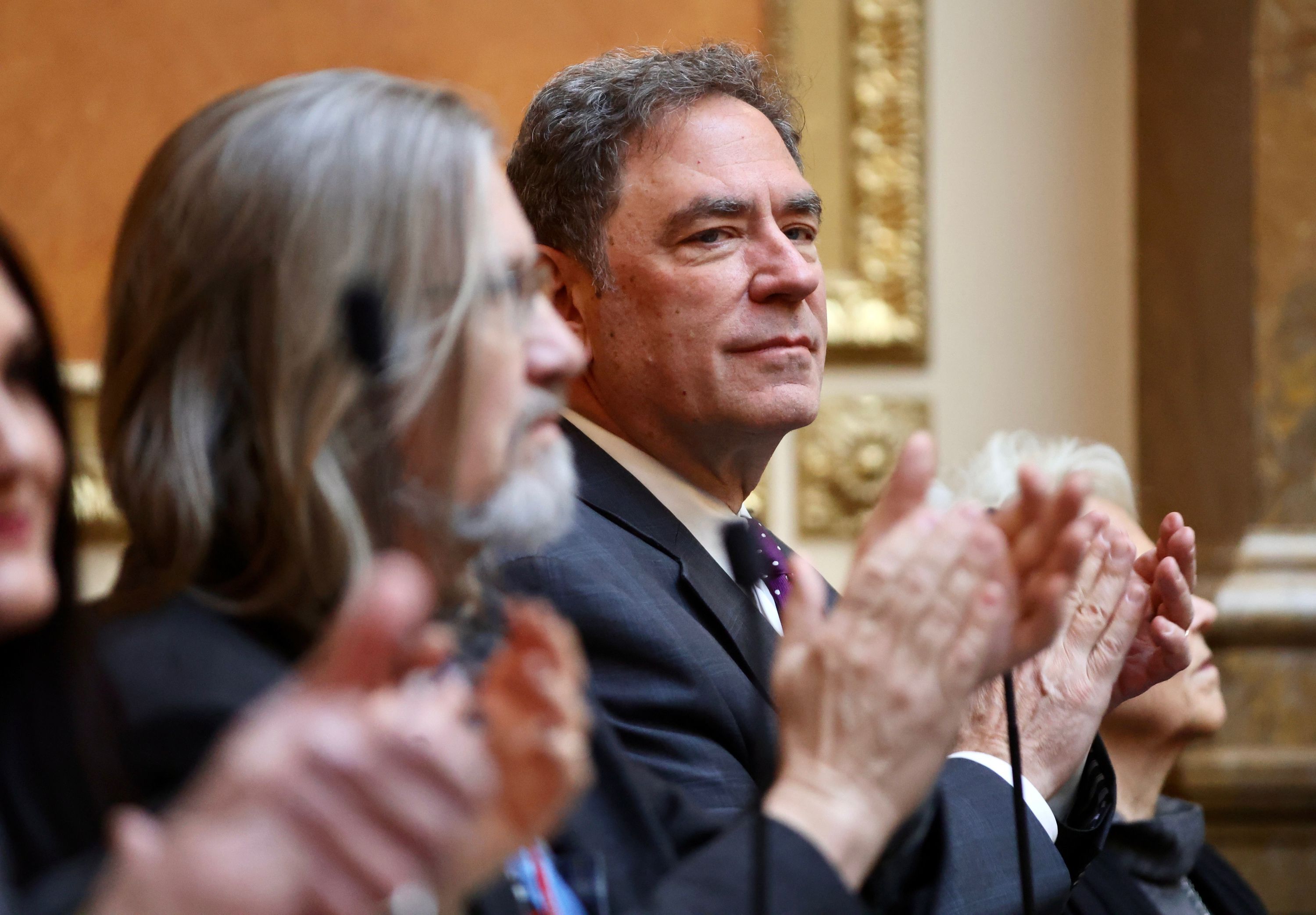 Rep. Brian King, D-Salt Lake City, applauds during the opening of the 2024 Legislature into session Tuesday.
