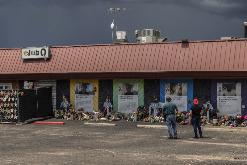 People visit a memorial outside Club Q, the LGBTQ nightclub that was the site of a deadly 2022 shooting that killed five people, June 7, 2023, in Colorado Springs, Colo.